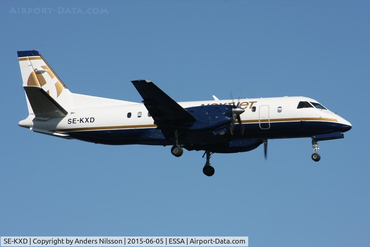 SE-KXD, 1991 Saab 340B C/N 340B-248, On short final for runway 19L.