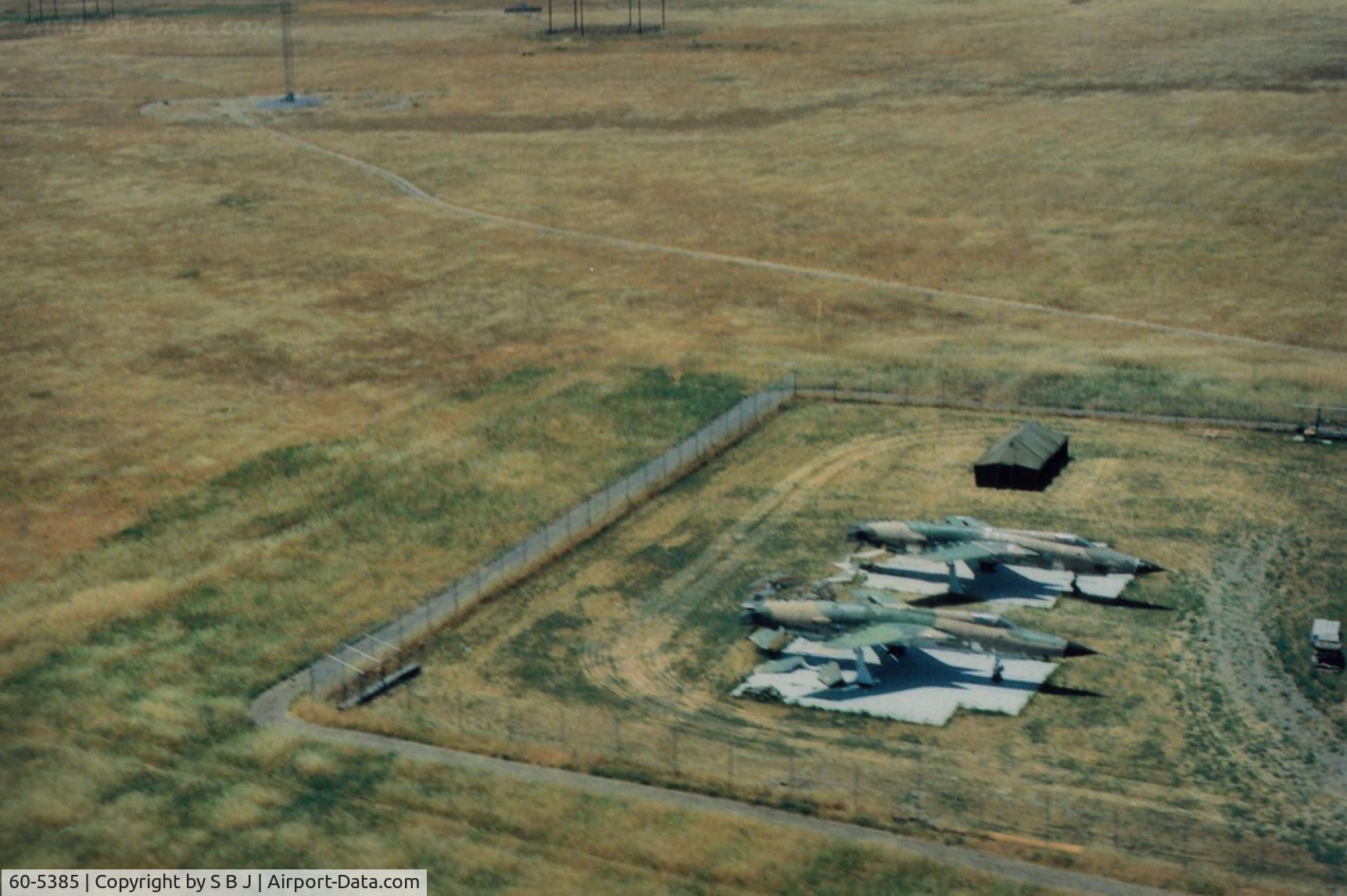 60-5385, 1960 Republic F-105D Thunderchief C/N D235, These two Republic F 105s were seen in the mid 80s near Davis,Calif. Since there was no airport in sight and the tent,my guess is National Guard training. Were gone in several years.