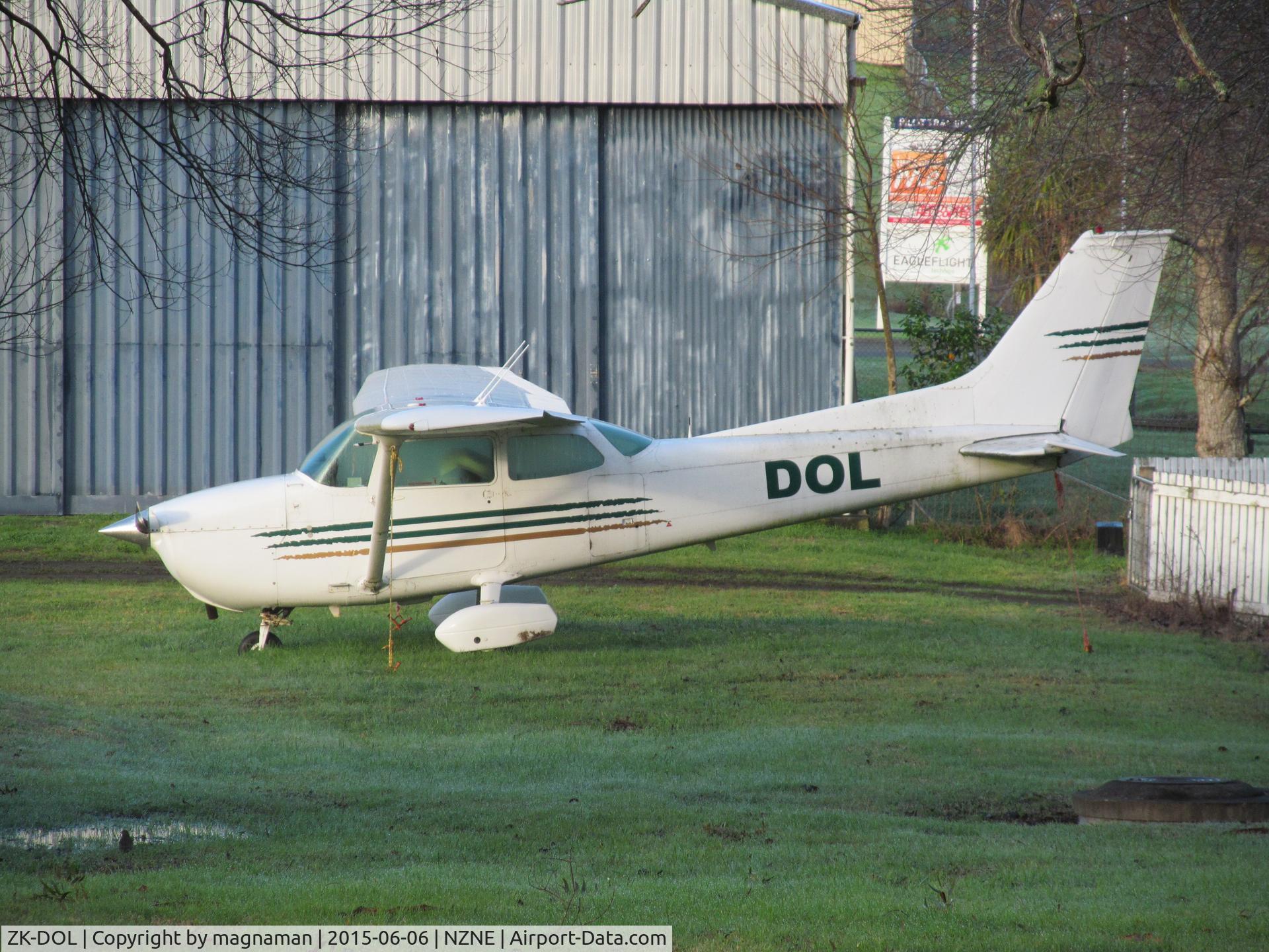 ZK-DOL, Cessna 172M C/N 17261824, resting under trees until it gets scrapped