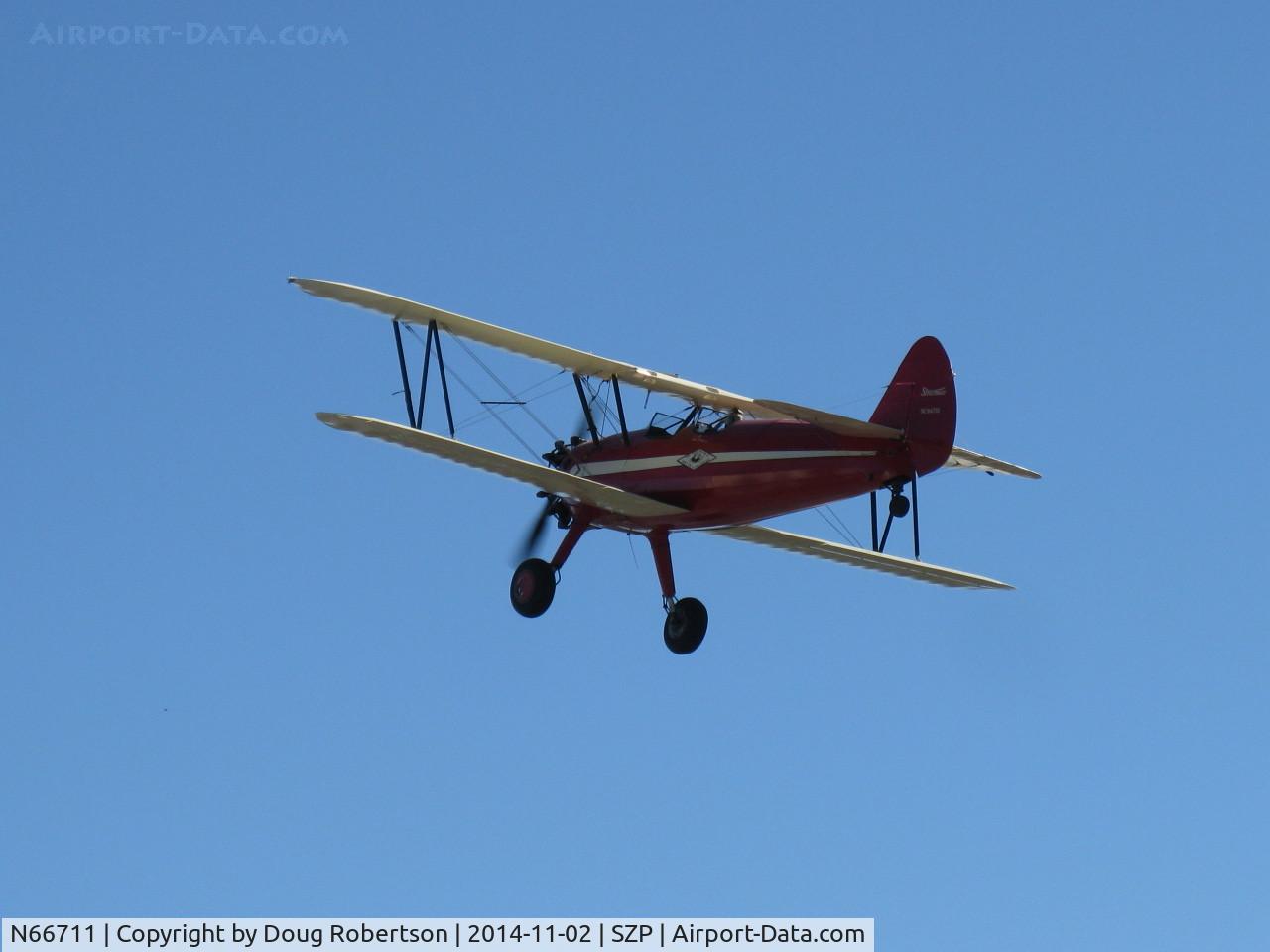 N66711, 1941 Boeing IB75A C/N 75-1675, 1941 Boeing IB75A, Jacobs R755B2 275 Hp upgrade, takeoff climb Rwy 04