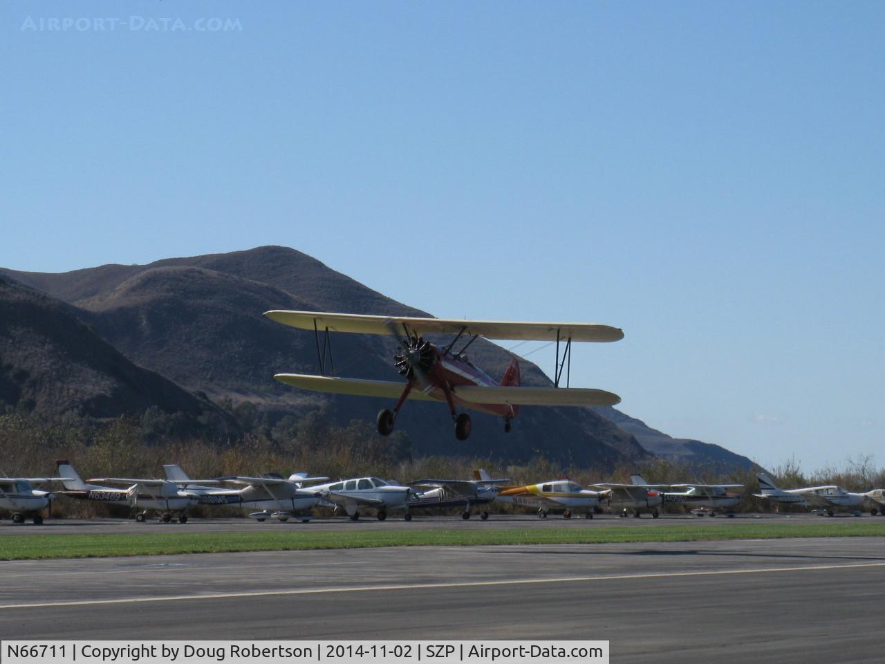 N66711, 1941 Boeing IB75A C/N 75-1675, 1941 Boeing Stearman IB75A, Jacobs R755B2 275 Hp upgrade, takeoff climb Rwy 04