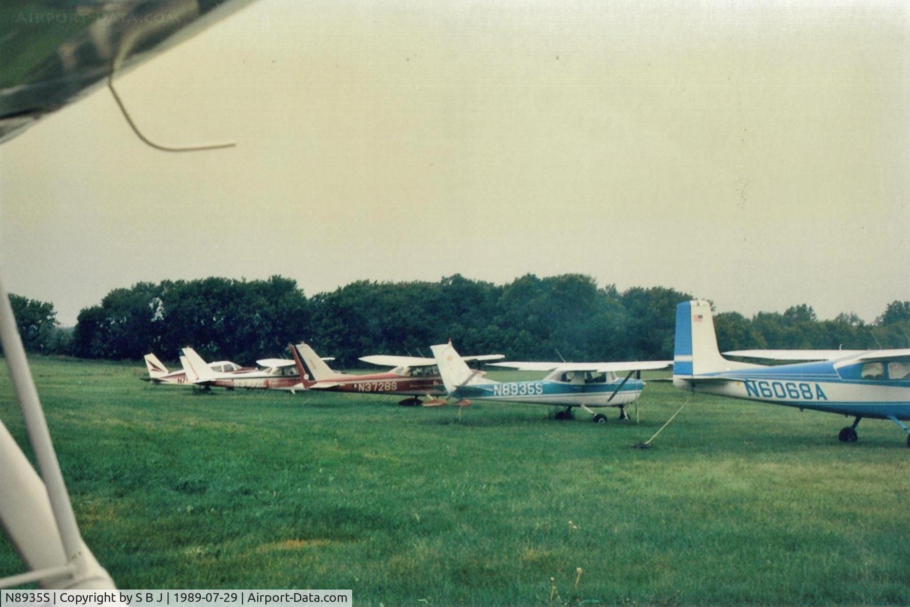 N8935S, 1965 Cessna 150F C/N 15062235, As I taxied out at an Illinois airport the C172 at the end N3732L caught my interest.Unable to stop,I snapped this picture but it looked like 35S was not flying much.
