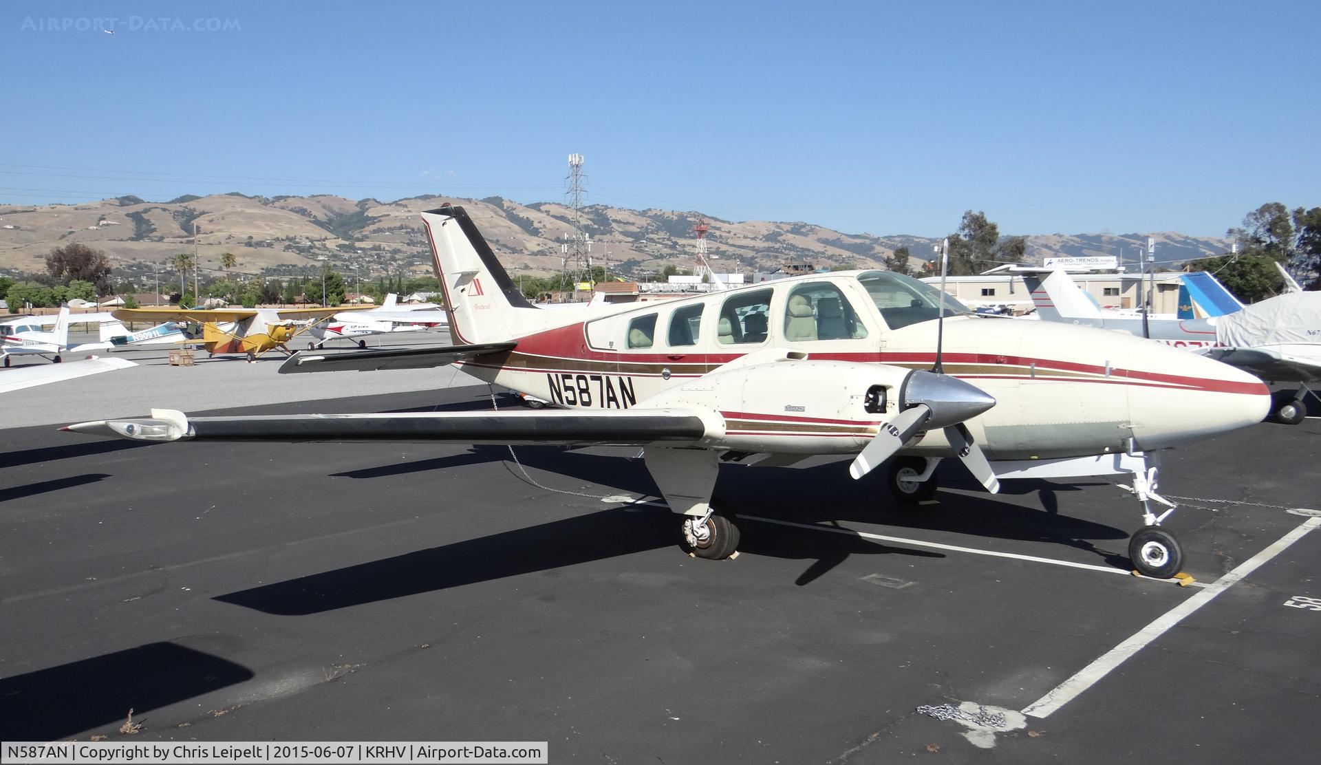 N587AN, Beechcraft 58 Baron C/N TH-1530, A local Beechcraft Baron 58 (CALIFORNIA NICE AIR, CA) in a new parking spot near Discovery Air at Reid Hillview Airport, CA. It used to be parked under the shelters at the south end of the airport.