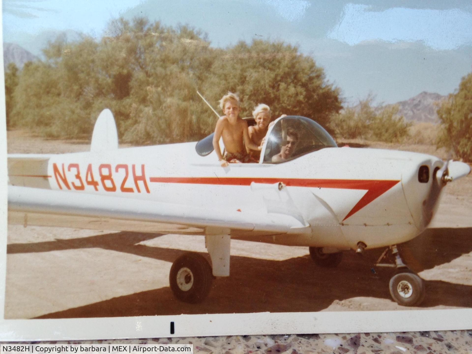 N3482H, 1948 Erco 415D Ercoupe C/N 4107, Early 1970's Rio Hardy River Mexico. My dads friend flew down in this plane for the weekend. Landed and took off from a dirt road. Here he takes my brother and me for a ride.