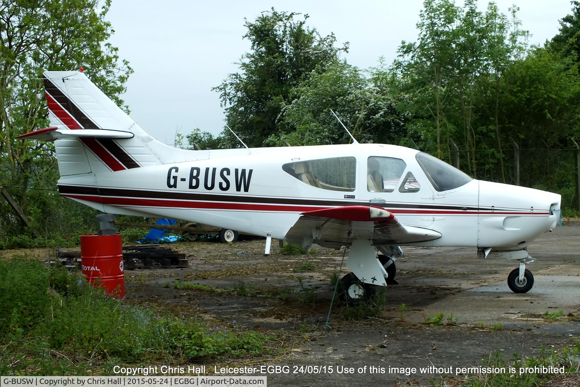 G-BUSW, 1976 Rockwell Commander 114 C/N 14079, parked at Leicester