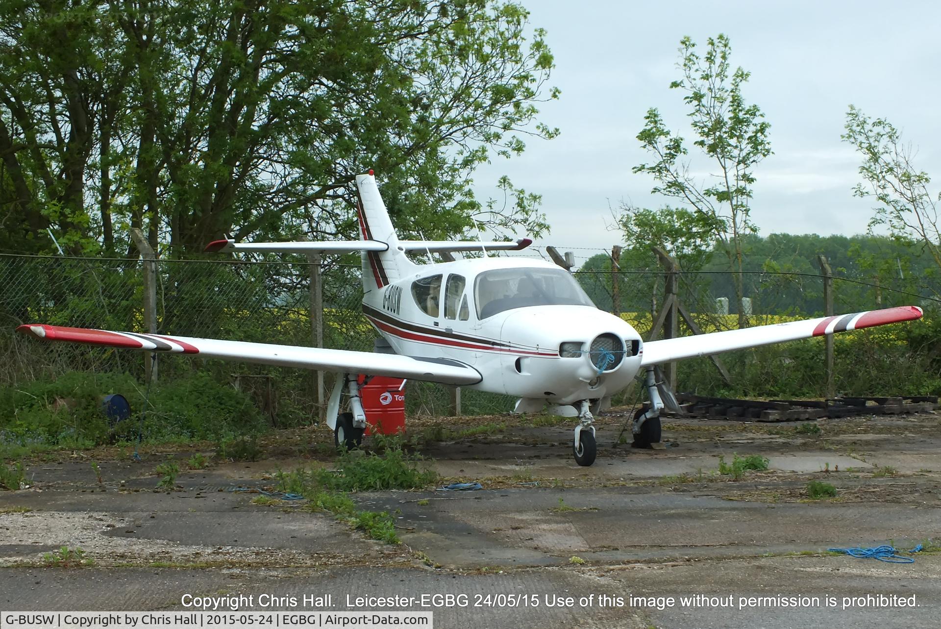 G-BUSW, 1976 Rockwell Commander 114 C/N 14079, parked at Leicester