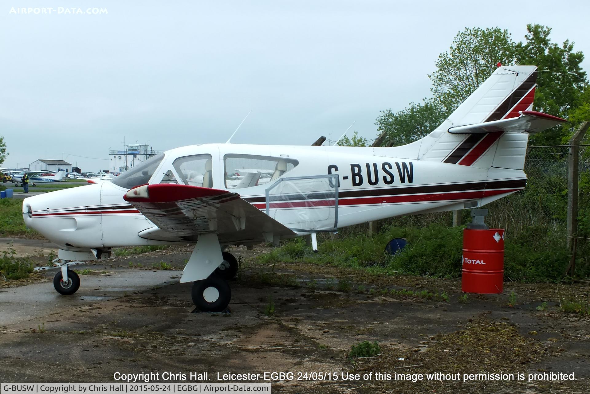 G-BUSW, 1976 Rockwell Commander 114 C/N 14079, parked at Leicester