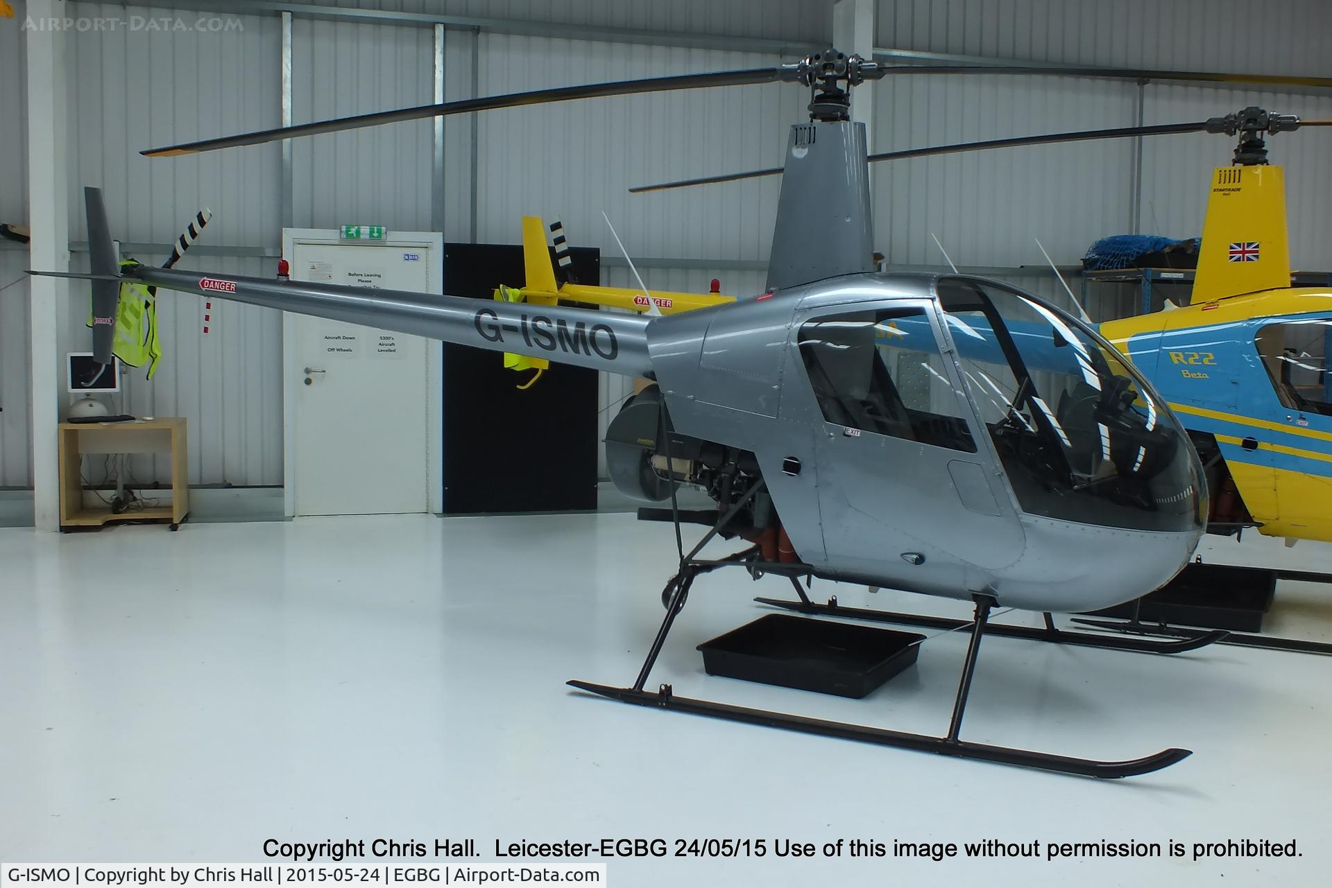 G-ISMO, 1988 Robinson R22 Beta C/N 0870, inside the Flyheli hangar