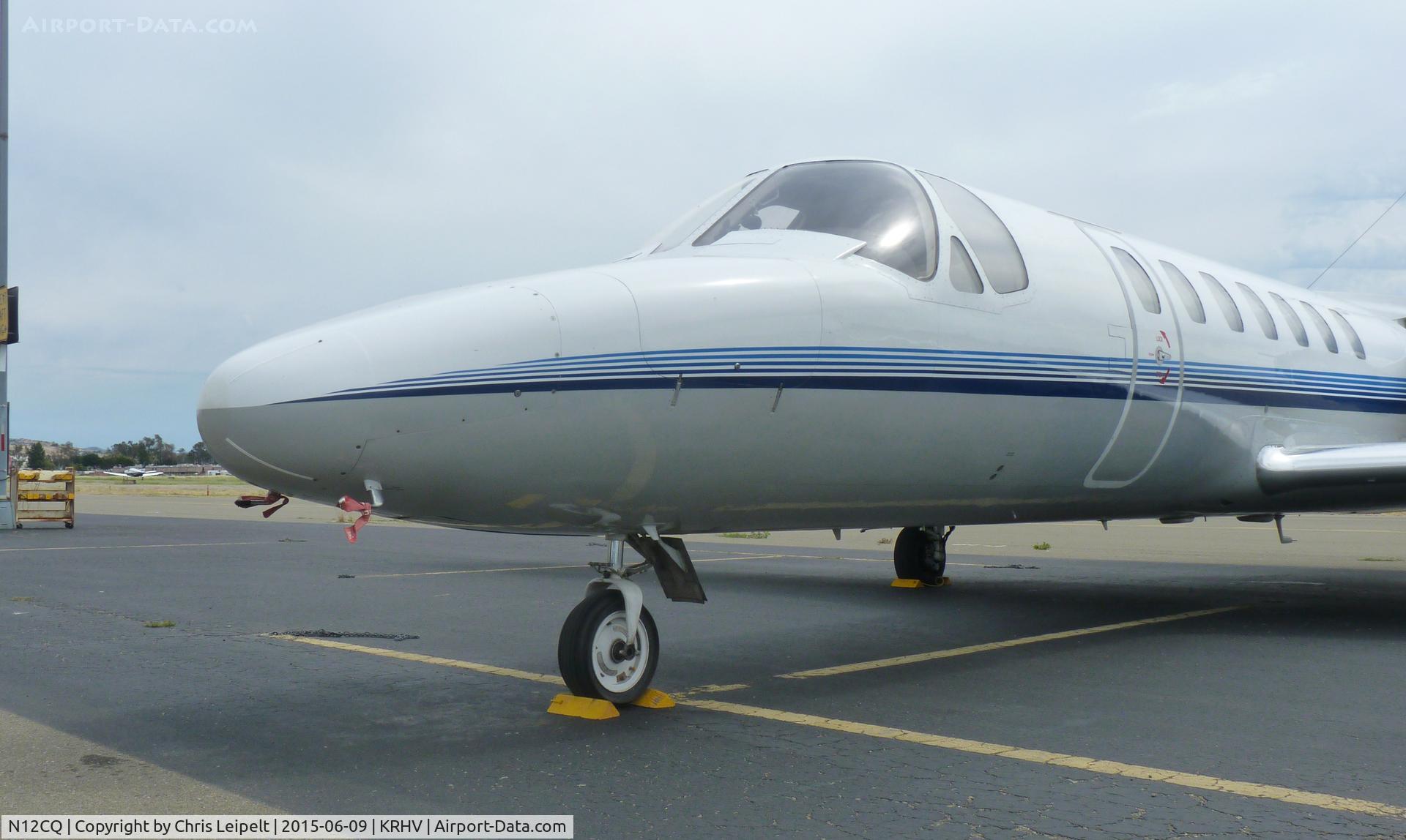 N12CQ, 1993 Cessna 560 Citation Ultra C/N 560-0231, A transient 1993 Cessna Citation 560 Ultra (a frequent visitor) sitting at the transient ramp at Reid Hillview Airport, CA to avoid the high cost of tie down fees at San Jose Intl. Airport while a local TBM 850 rotates in the background.