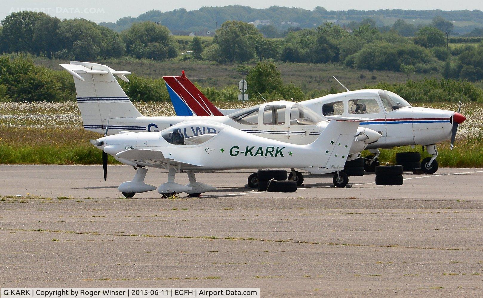 G-KARK, 2006 Dyn'Aero MCR-01 Club C/N PFA 301A-14010, Visiting MCR-01 Club built from a kit by the owner. Dwarfed by two resident light aircraft. 