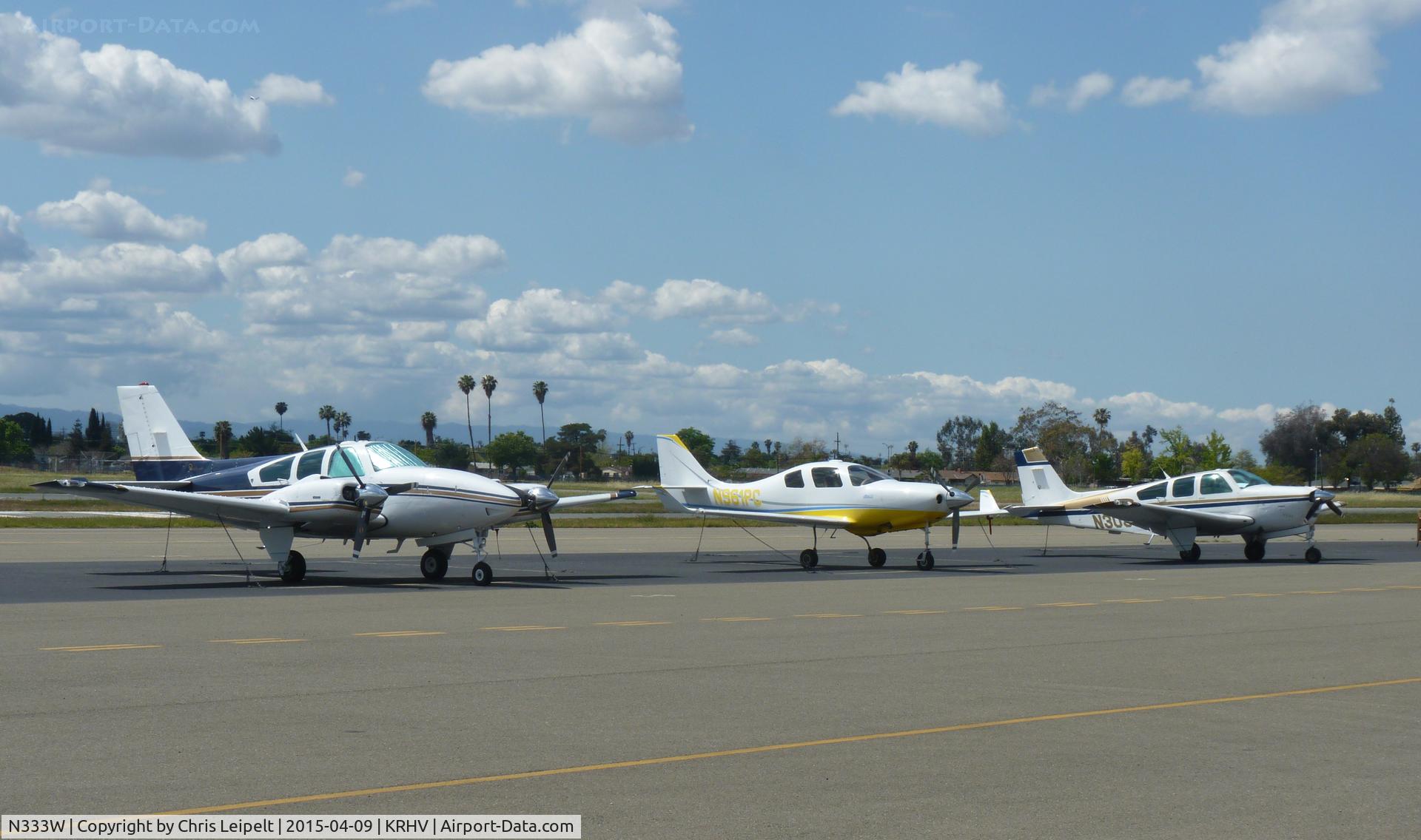 N333W, 1979 Beech E-55 Baron C/N TE-1172, A transient 1979 Beechcraft Baron E-55 (GRECMAR AIR INC · WILMINGTON DE) visiting Reid Hillview Airport, CA with another Bonanza and Lanciar.