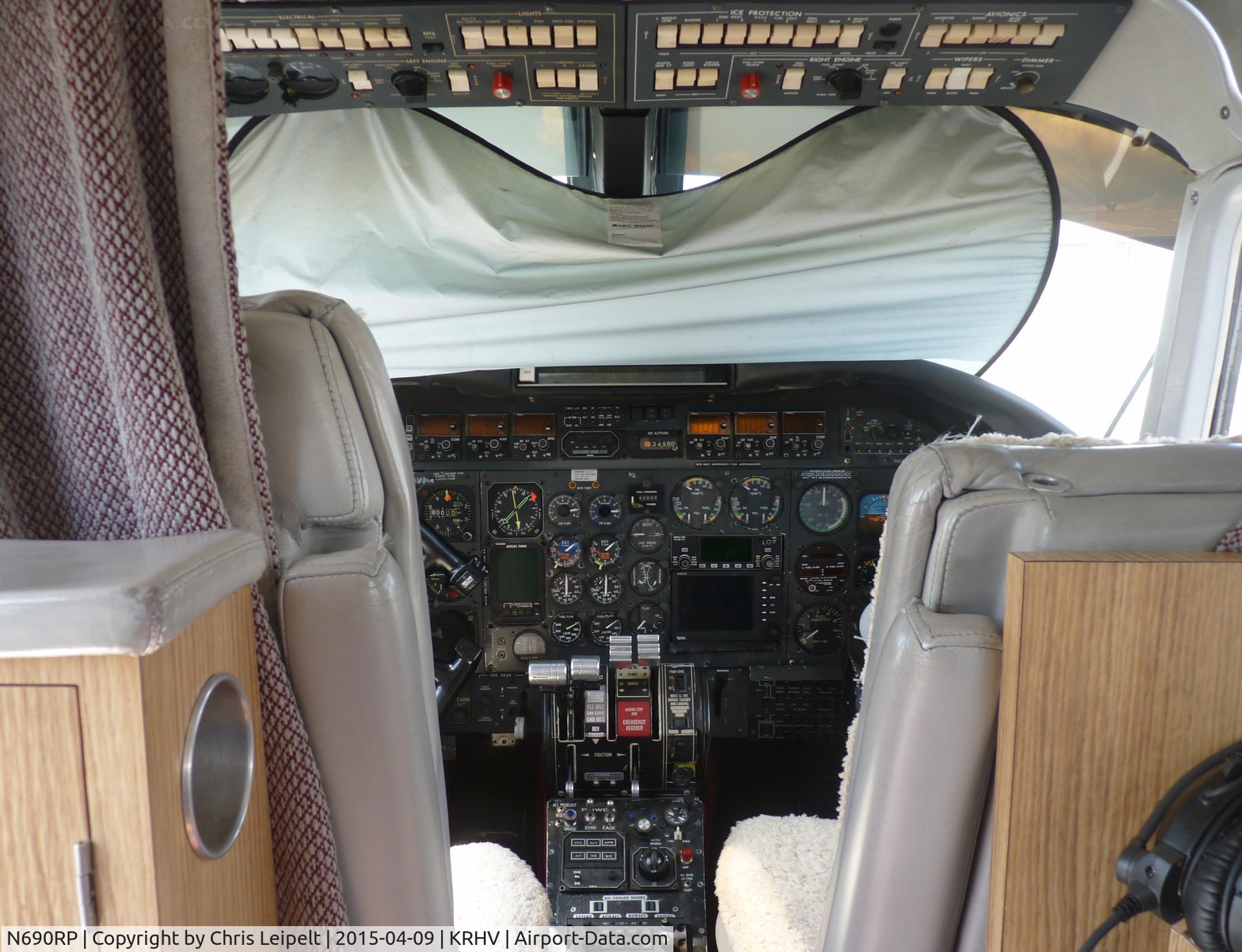 N690RP, 1978 Rockwell International 690B C/N 11493, The cockpit of a local 1978 Rockwell Aero Commander 690B located at the south tie downs at Reid Hillview Airport, CA. This is one of the last cockpit shots I've gotten of this plane before it got a new cover, so I can no longer go inside.