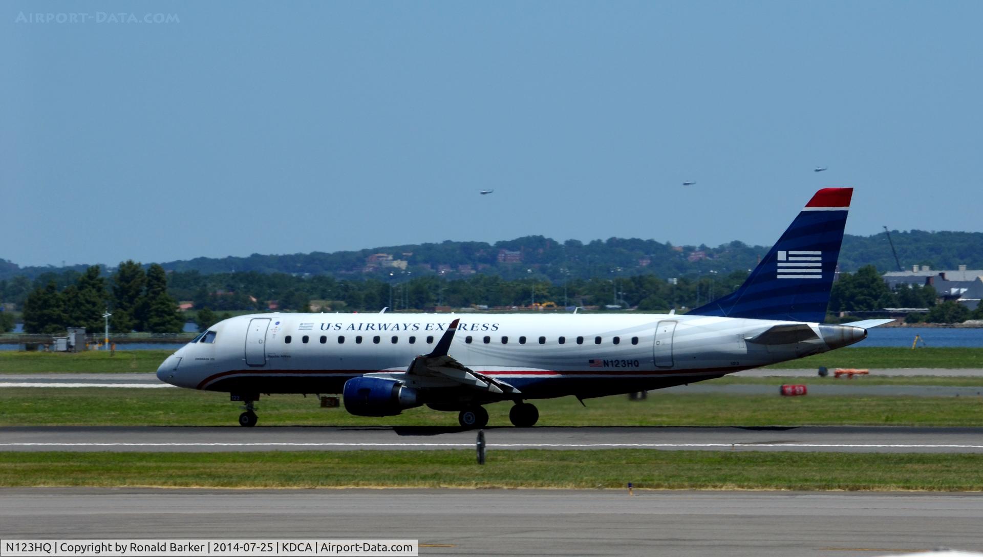 N123HQ, 2007 Embraer 175LR (ERJ-170-200LR) C/N 17000199, Takeoff roll National  Three helo's in background