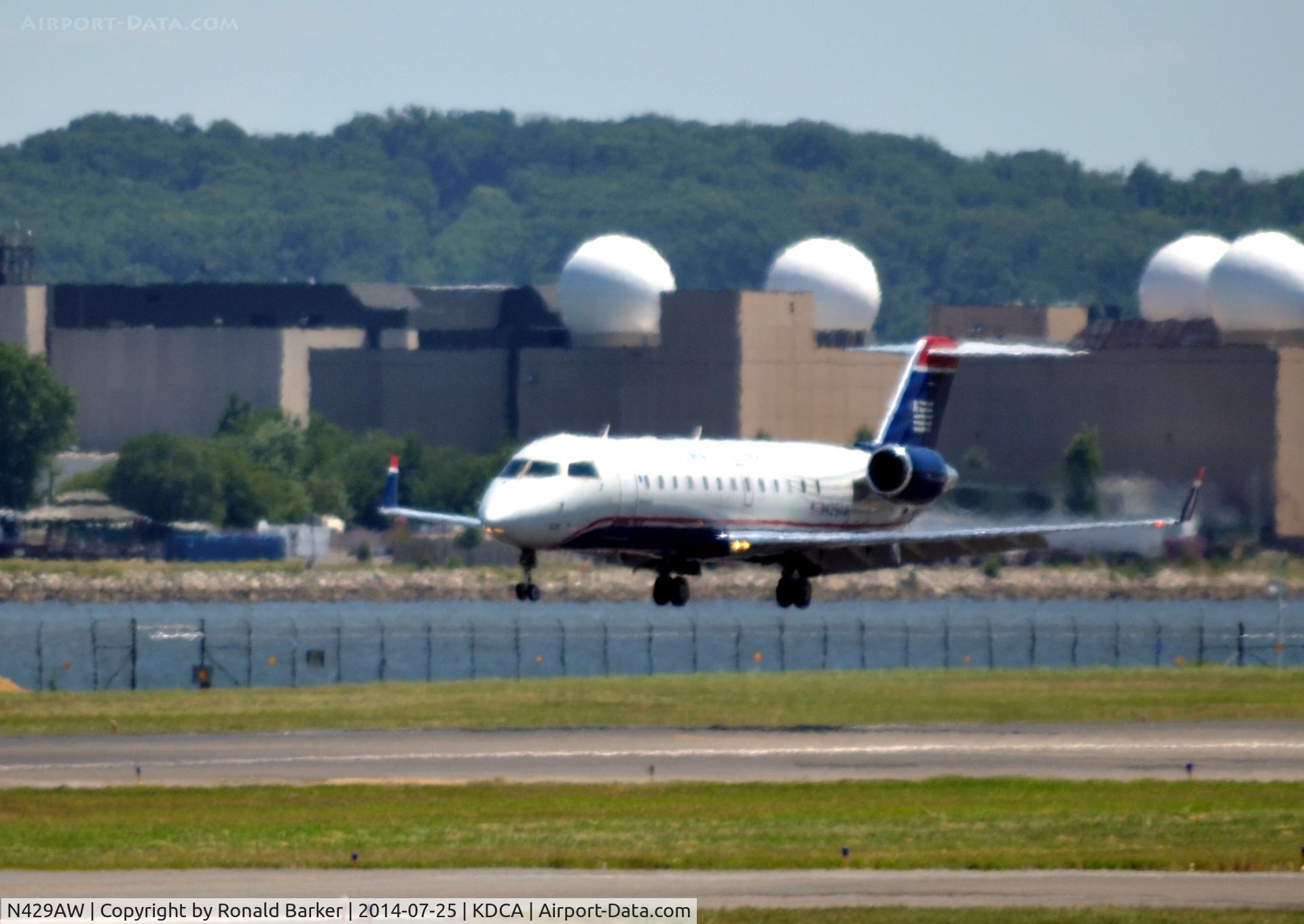 N429AW, 2002 Bombardier CRJ-200LR (CL-600-2B19) C/N 7711, Landing National