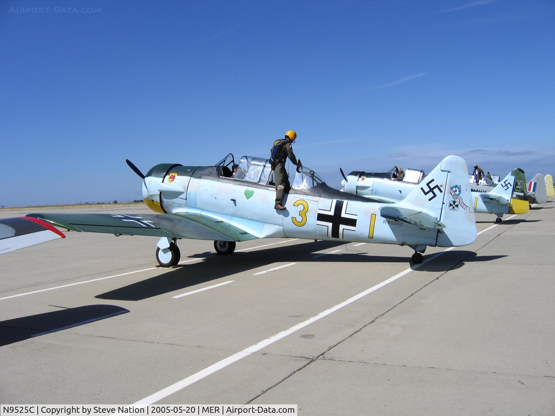 N9525C, North American AT-6C Texan C/N 88-12407, Richard Sykes AT-6C in Luftwaffe colors @ Castle AFB, CA.  Aircraft sustained substantial damage to leading edge of right wing on December 7, 2006 after striking wooden target during mock bombing run at Mojave Airport, CA.  No injuries to pilot and passen