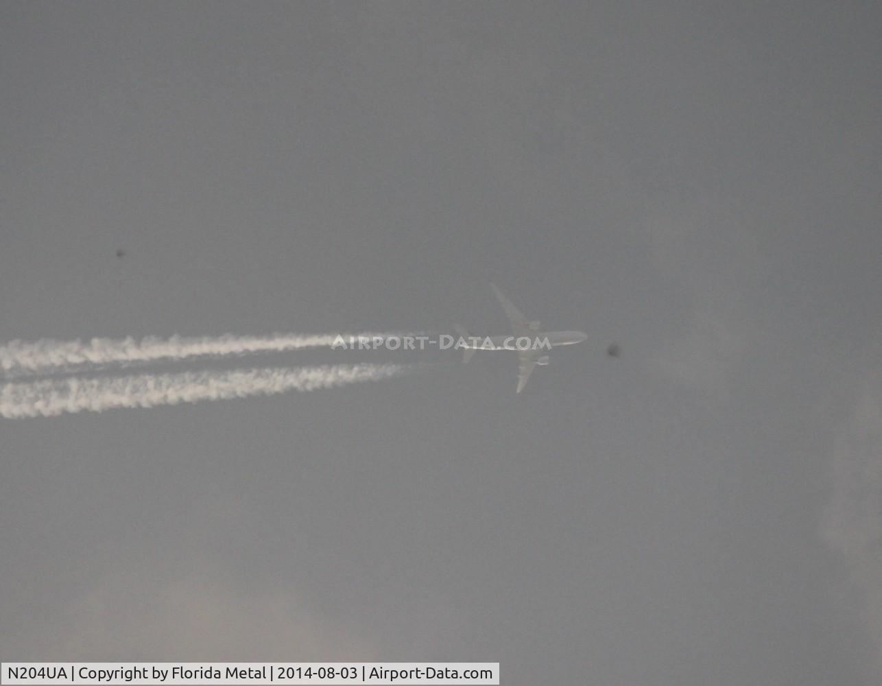 N204UA, 1999 Boeing 777-222/ER C/N 28713, United 777-200 about 36,000 ft over Livonia Michigan flying ORD-CDG