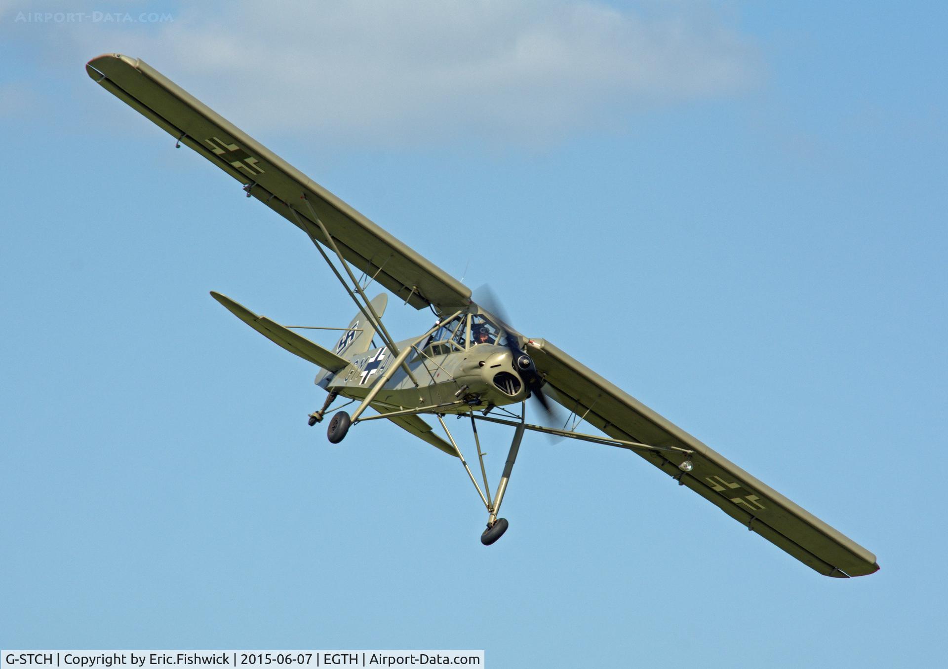 G-STCH, 1942 Fieseler Fi-156A-1 Storch C/N 2088, 44. G-STCH in display mode at The Shuttleworth Flying Day and LAA Party in the Park, June 2015.