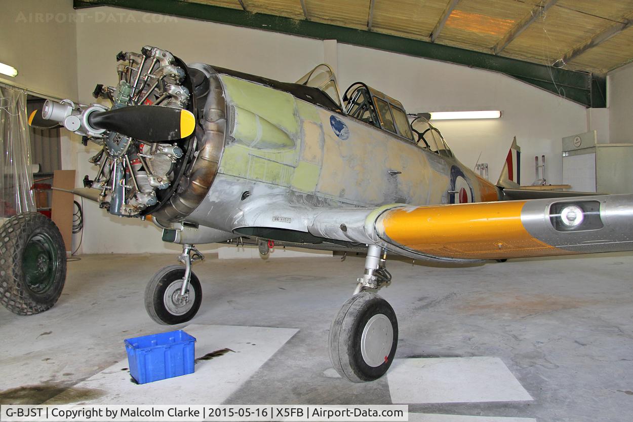 G-BJST, 1953 Canadian Car & Foundry T-6H Harvard Mk.4M C/N 14A-2429, Canadian Car & Foundry T-6H Harvard 4M undergoing renovation by RS Paintworks at Fishburn Airfield, may 16th 2015.