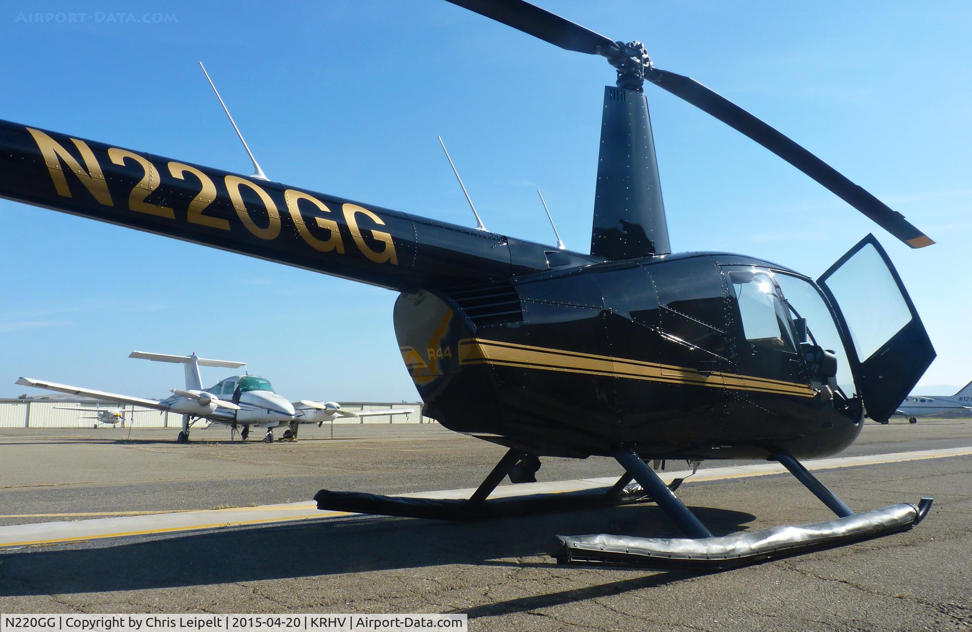 N220GG, 2009 Robinson R44 II C/N 12820, A local 2009 Robinson R44 II sitting in front of its hangar at the south tie downs at Reid Hillview Airport, CA.