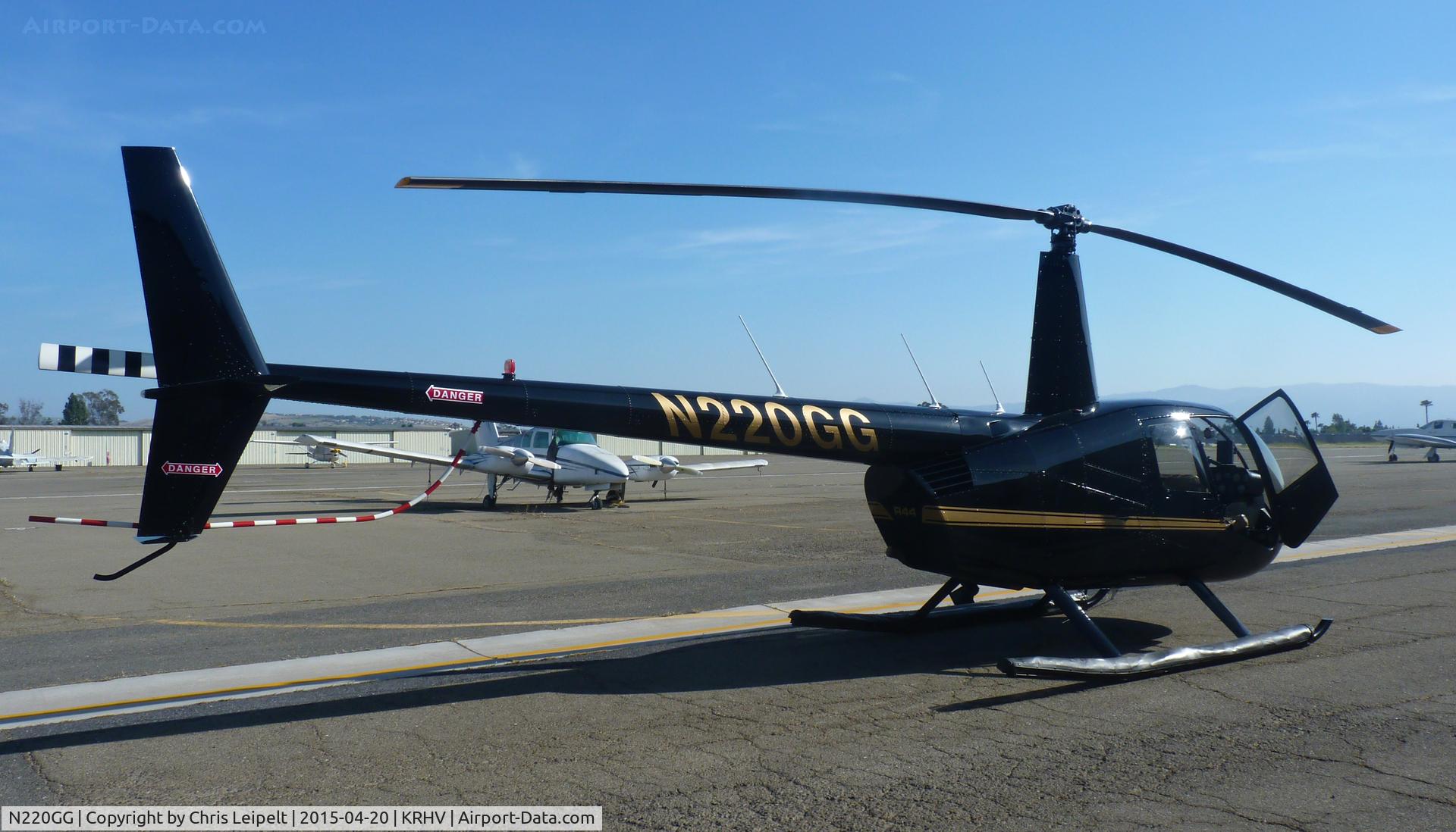 N220GG, 2009 Robinson R44 II C/N 12820, A local 2009 Robinson R44 II sitting in front of its hangar at the south tie downs at Reid Hillview Airport, CA.