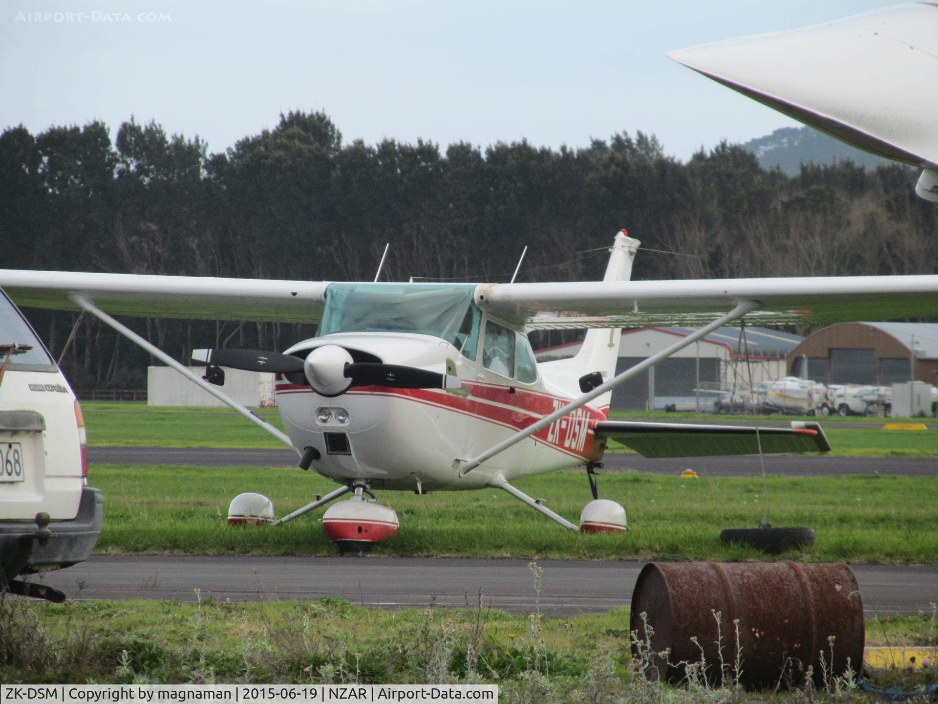ZK-DSM, Cessna 172M C/N 17262374, on crowded maintenance ramp