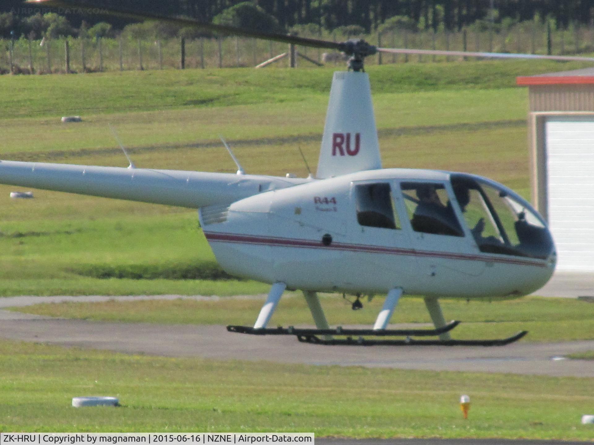 ZK-HRU, Robinson R44 II C/N 11215, side on way down runway