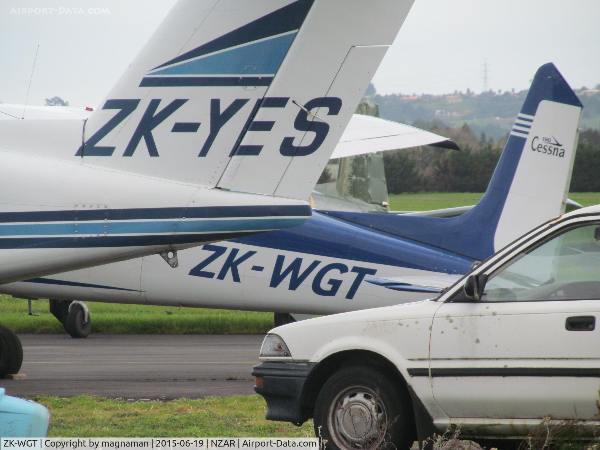 ZK-WGT, Cessna 180 C/N 30012, Awaiting its turn on cramped apron