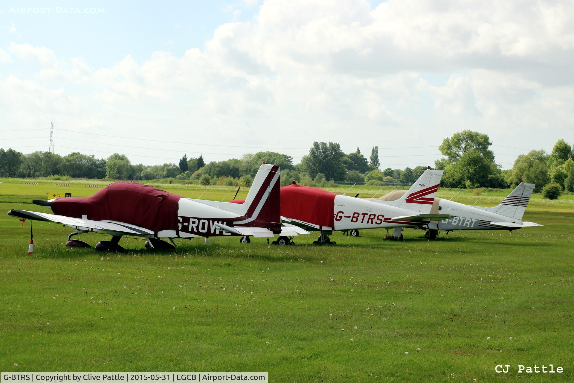 G-BTRS, 1981 Piper PA-28-161 Cherokee Warrior II C/N 28-8116004, In amongst a line-up in the GA park at Barton Airfield, Manchester - EGCB
