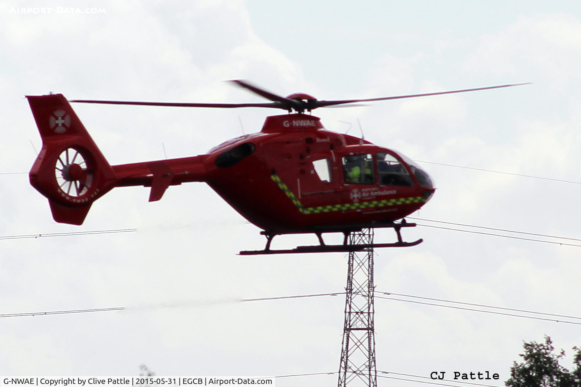 G-NWAE, 2003 Eurocopter EC-135T-2 C/N 0312, Off for another sortie from Barton EGCB, Manchester, the Northwest Air Ambulance