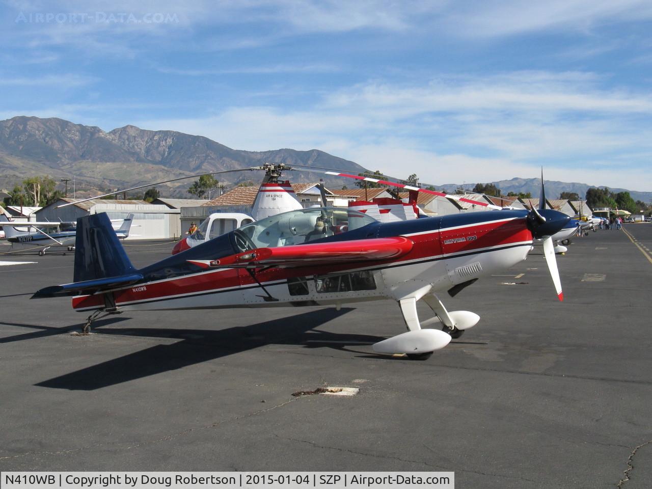 N410WB, 1991 Extra EA-300 C/N 029, 1991 Extra Fleugzeugbau Gmbh EXTRA EA-300, Lycoming AEIO-540-L1B5 300 Hp, note: easier, less disorienting view of aileron spade. Extra fenestration aids inverted flight.