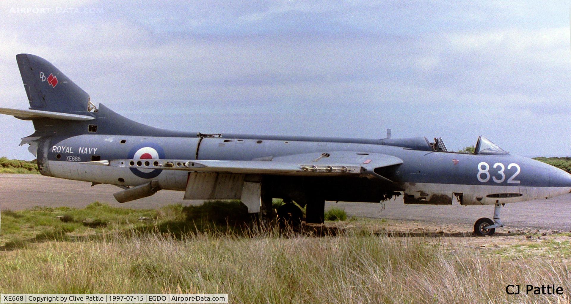 XE668, 1955 Hawker Hunter GA.11 C/N HABL-003011, Facing a slow death at the fire fighting/crash rescue training base at RNAS Predannack EGDO, this ex RNAS Culdrose SAH aircraft now coded DD/832.