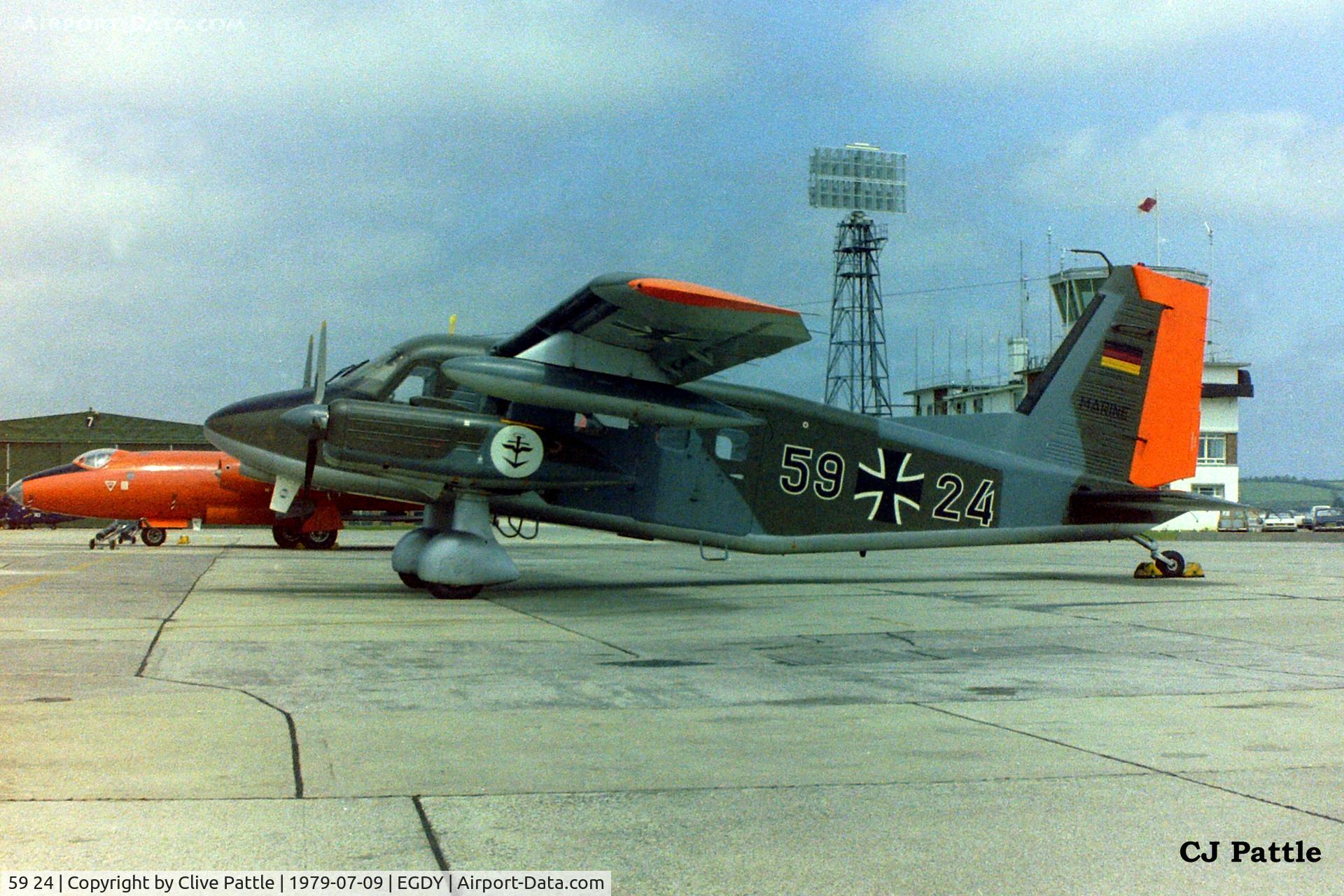 59 24, Dornier Do-28D-2 Skyservant C/N 4199, Scanned from a neg - Regular visitors to RNAS Yeovilton EGDY were Dornier's of the West German Marineflieger. This aircraft later became HA-ACZ. Parked in the rear is a WGAF Canberra 99 34.