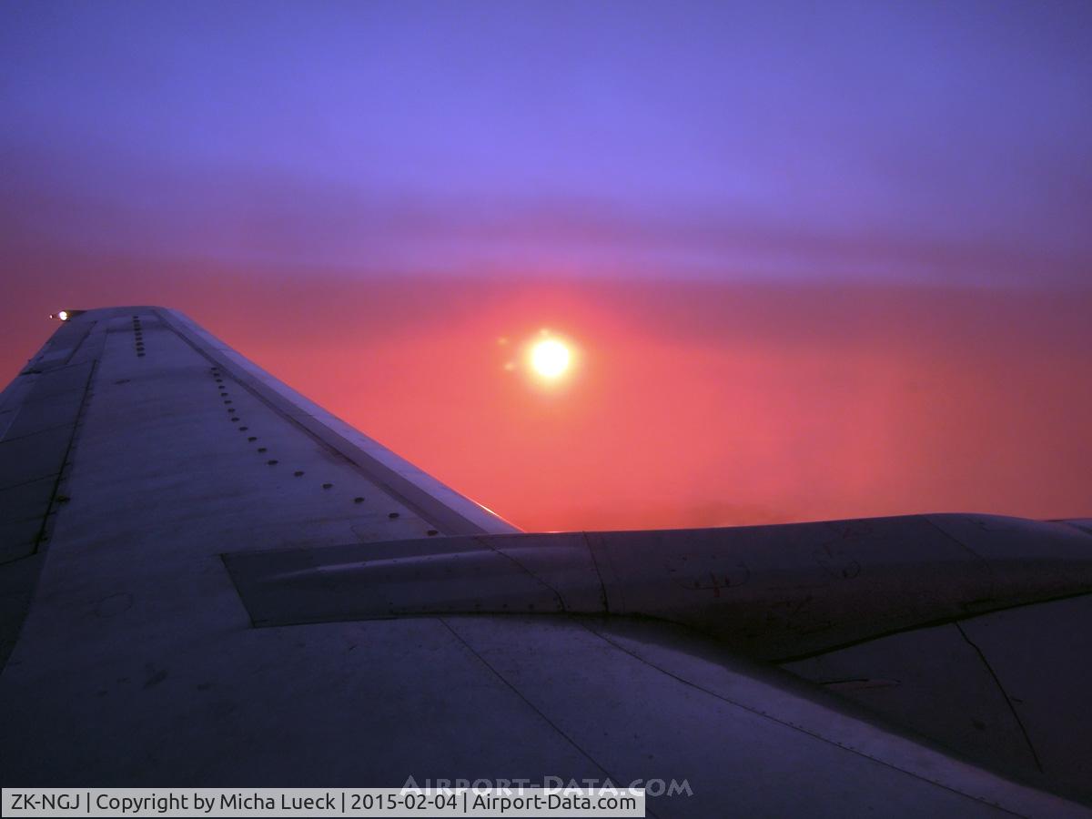 ZK-NGJ, 1999 Boeing 737-319 C/N 25609, Colourful sunrise on our way from Auckland to Wellington