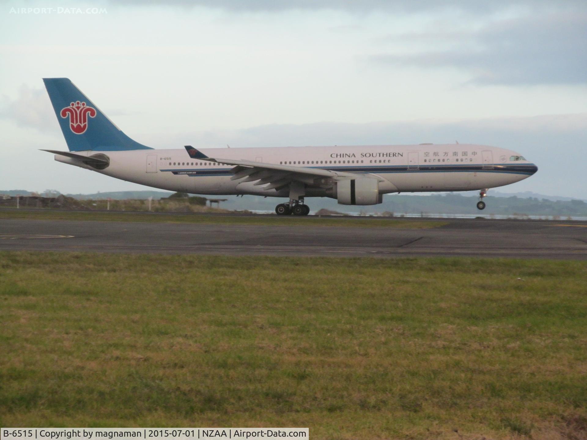 B-6515, 2010 Airbus A330-223 C/N 1116, landing at dusk at AKL