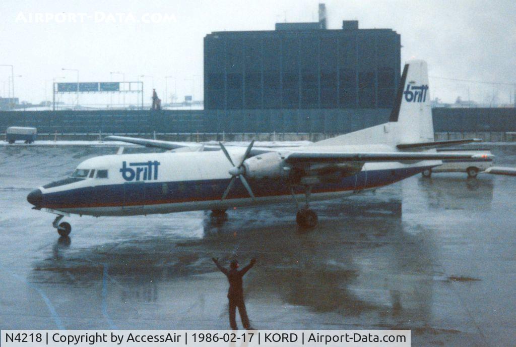 N4218, 1966 Fairchild Hiller FH-227B C/N 521, Britt Airways FH-227B, N4218 eases into the L-1 Gate on this dark and dreary day.