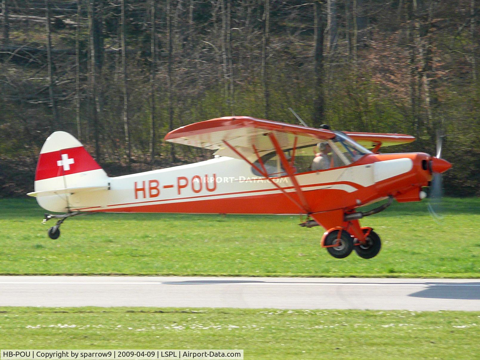 HB-POU, 1957 Piper PA-18-150 Super Cub Super Cub C/N 18-5731, landing on small airstrip
