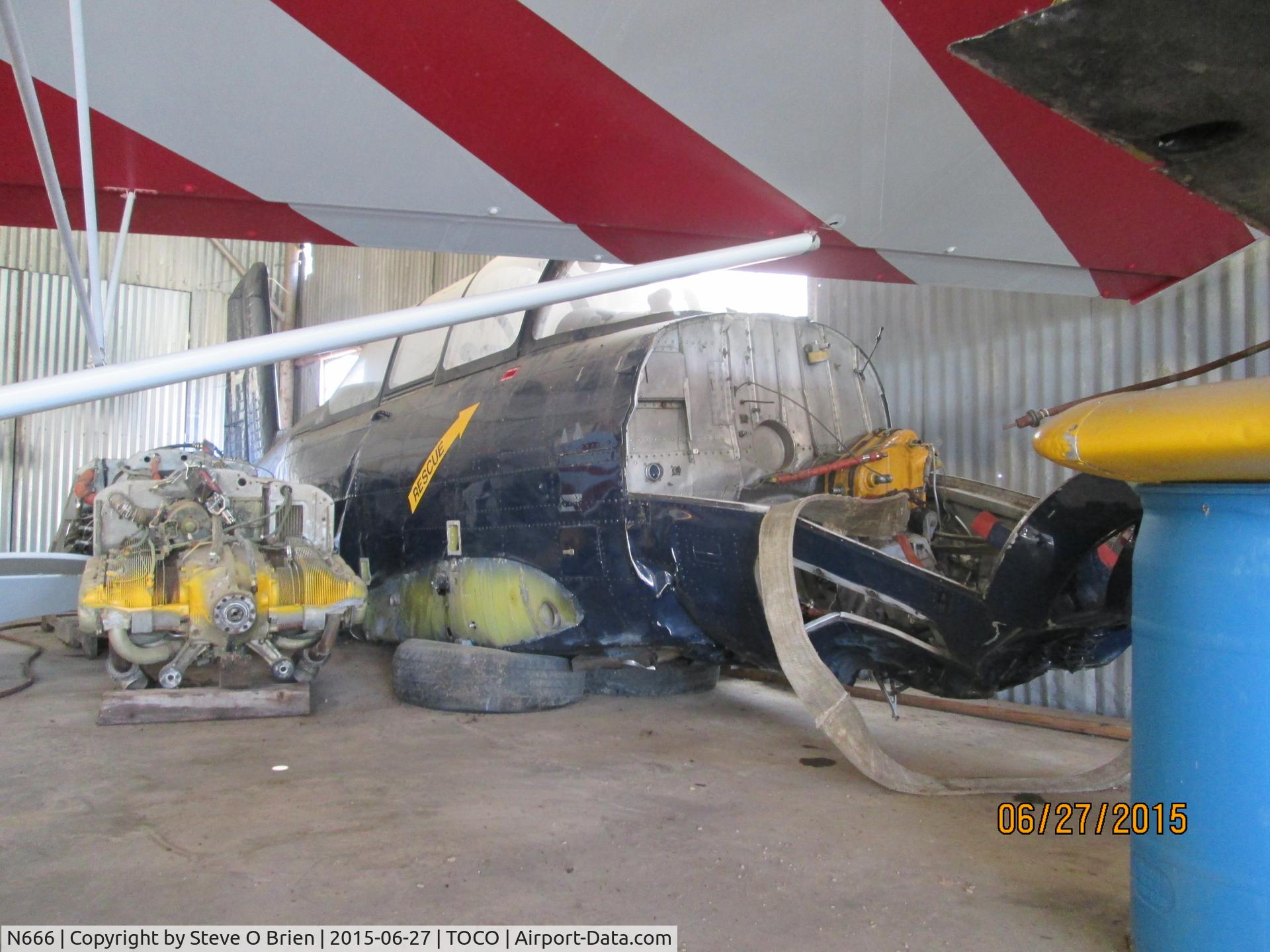 N666, 1958 Beech A45 C/N GM-141, Back of the hangar at Toco Tx