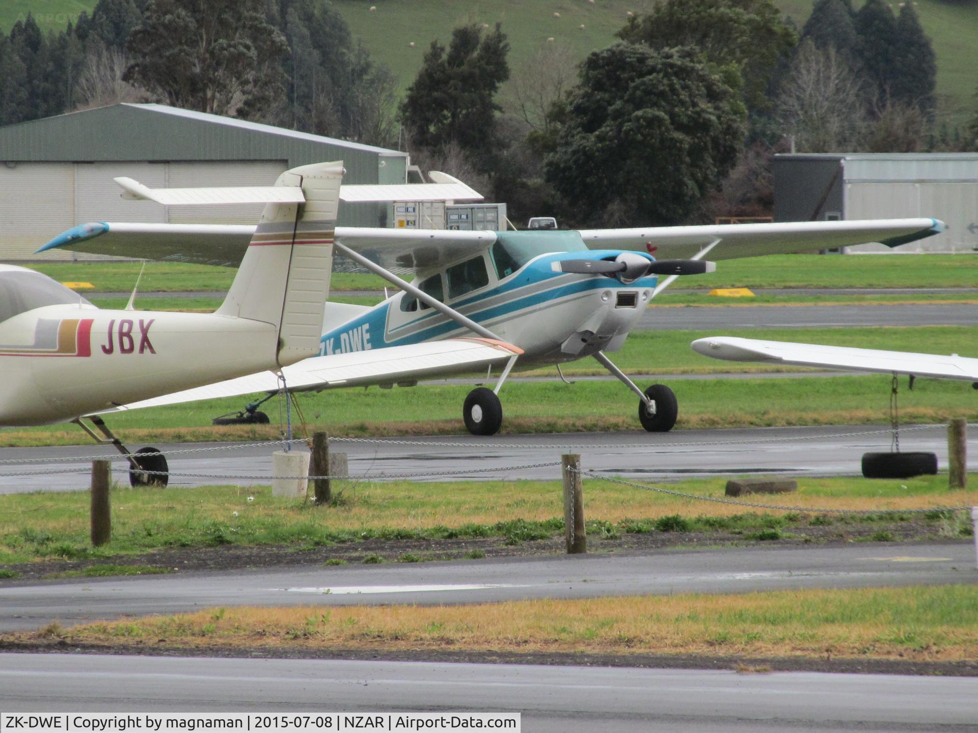ZK-DWE, 1974 Cessna A185F Skywagon 185 C/N 18502521, on crowded ramp - awaiting work