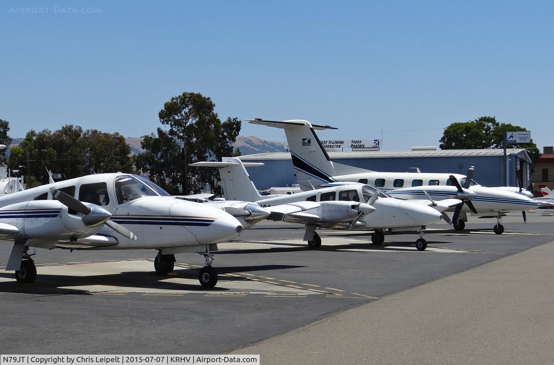 N79JT, 1979 Piper PA-44-180 Seminole C/N 44-7995255, A locally based 1979 Piper Seminole next to a huge local Piper Cheyenne IIII. I always thought these Seminoles were pretty big, but I guess not. Taken at Reid Hillview Airport, CA.