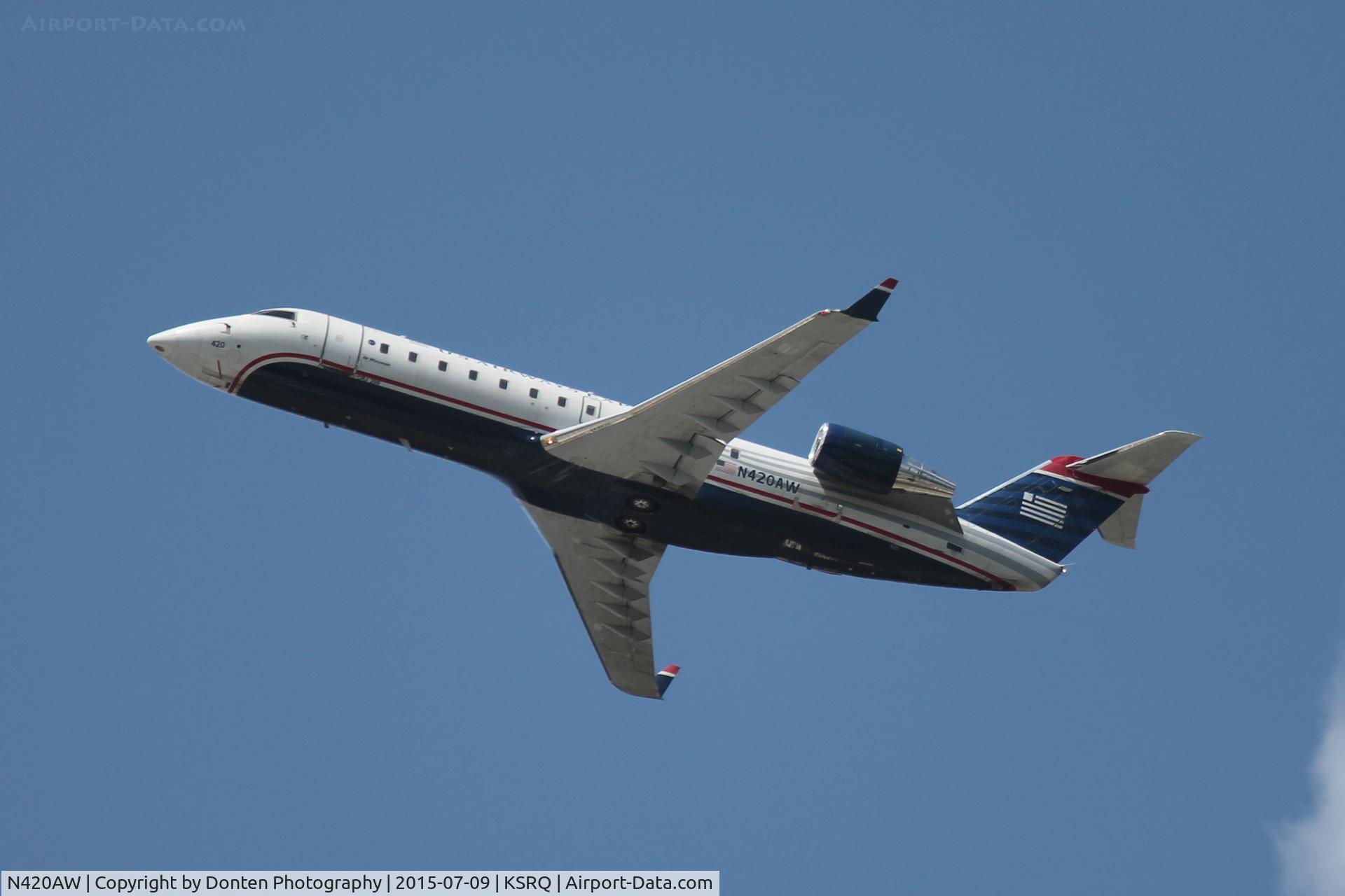 N420AW, 2002 Bombardier CRJ-200LR (CL-600-2B19) C/N 7640, American Flight 4024 operated by Air Wisconsin (N420AW) departs Sarasota-Bradenton International Airport enroute to Reagan National Airport