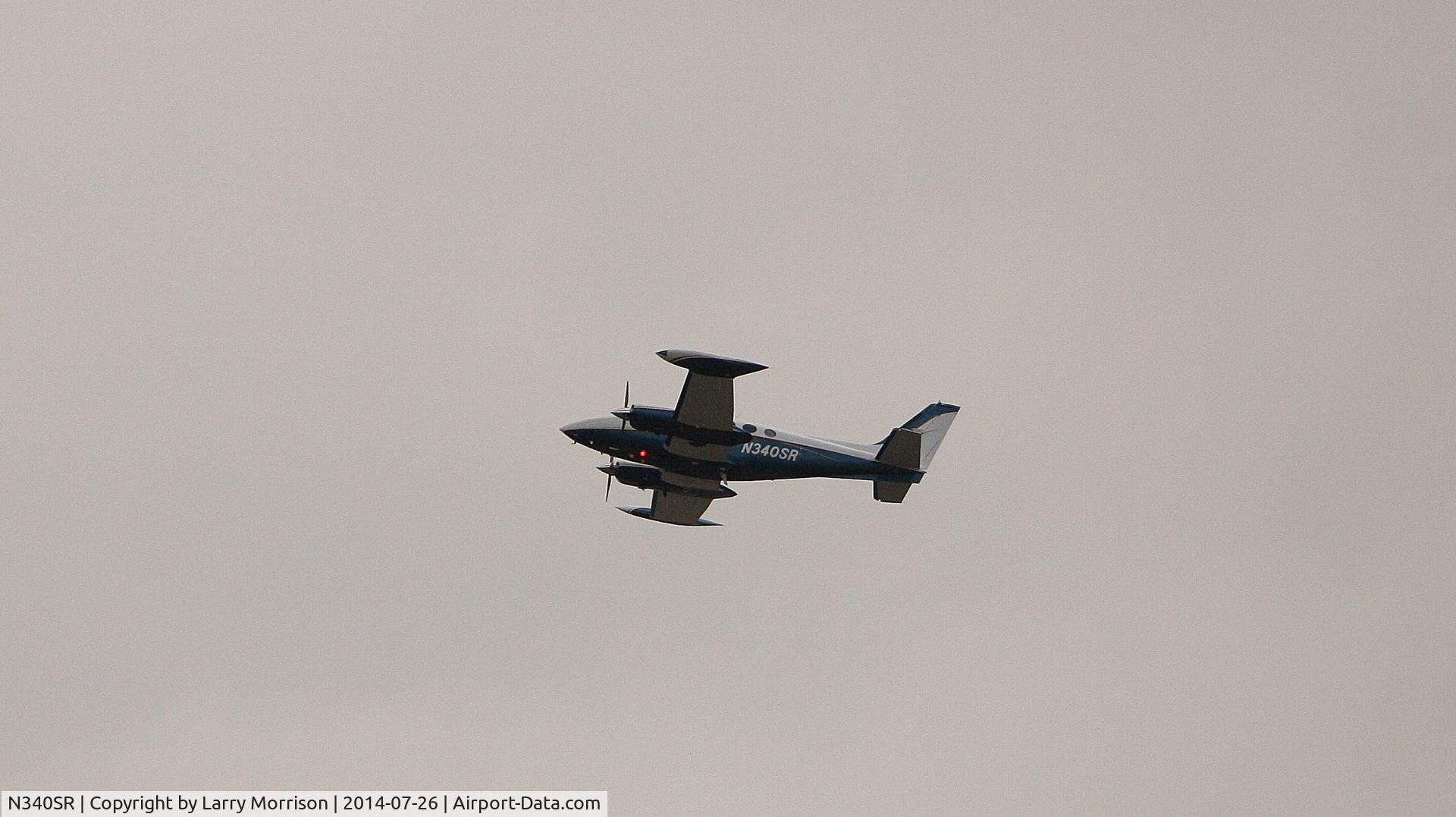 N340SR, Cessna 340A C/N 340A1228, Photographed flying over Superior CO July 26 2014