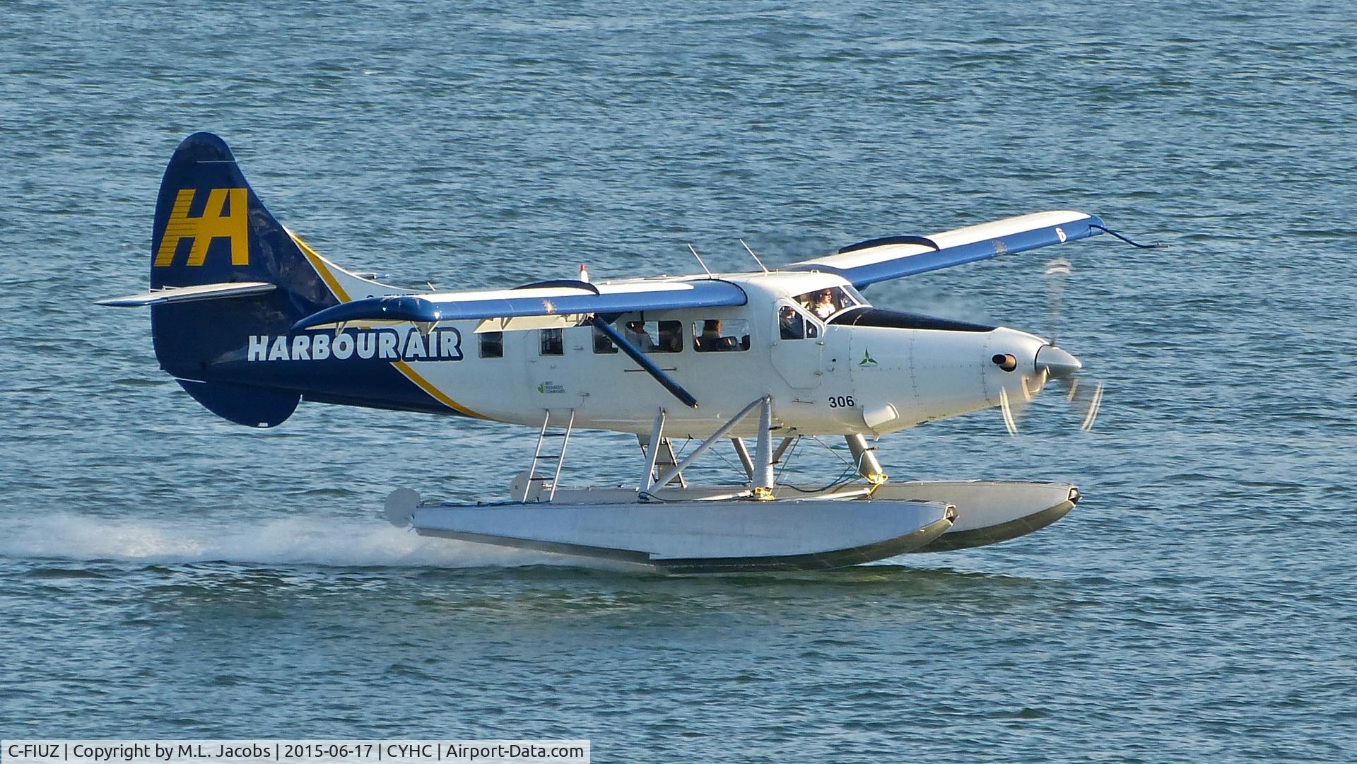 C-FIUZ, 1956 De Havilland Canada DHC-3T Vazar Turbine Otter C/N 135, Harbour Air #306 lifting off from Coal Harbour.