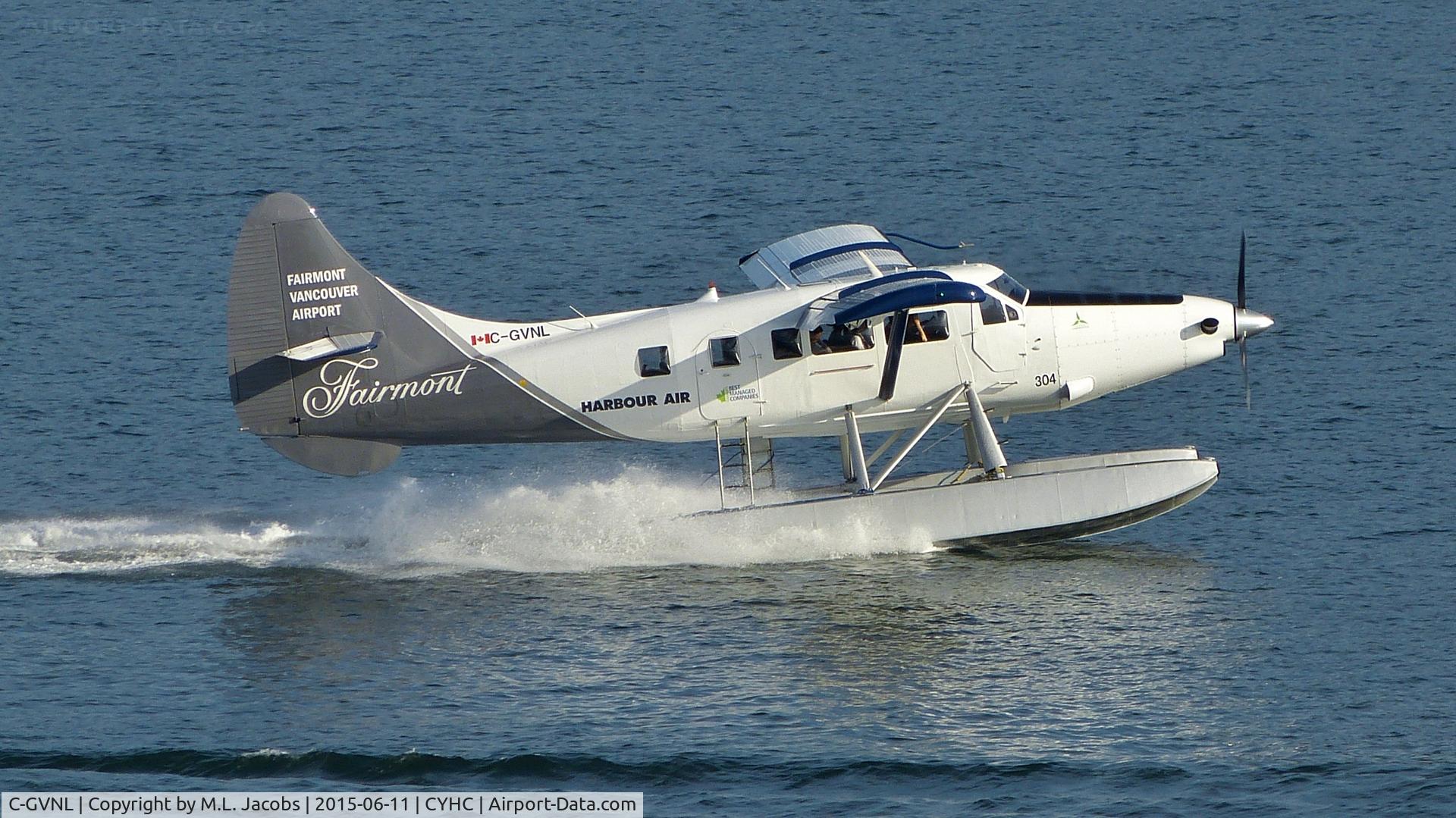 C-GVNL, 1956 De Havilland Canada DHC-3 Otter C/N 105, Harbour Air #304 taking off in Coal Harbour.