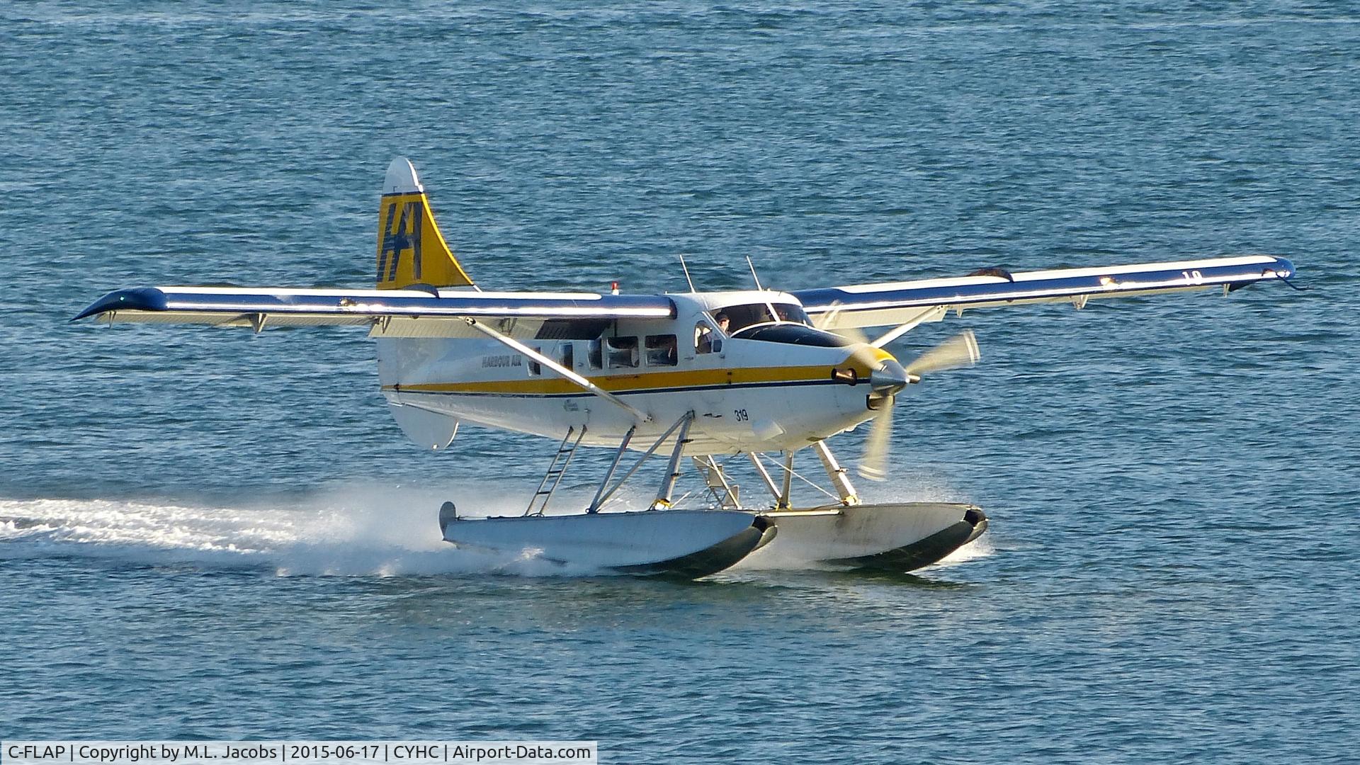 C-FLAP, 1958 De Havilland Canada DHC-3 Otter Otter C/N 289, Harbour Air #319 early morning landing in Coal Harbour.