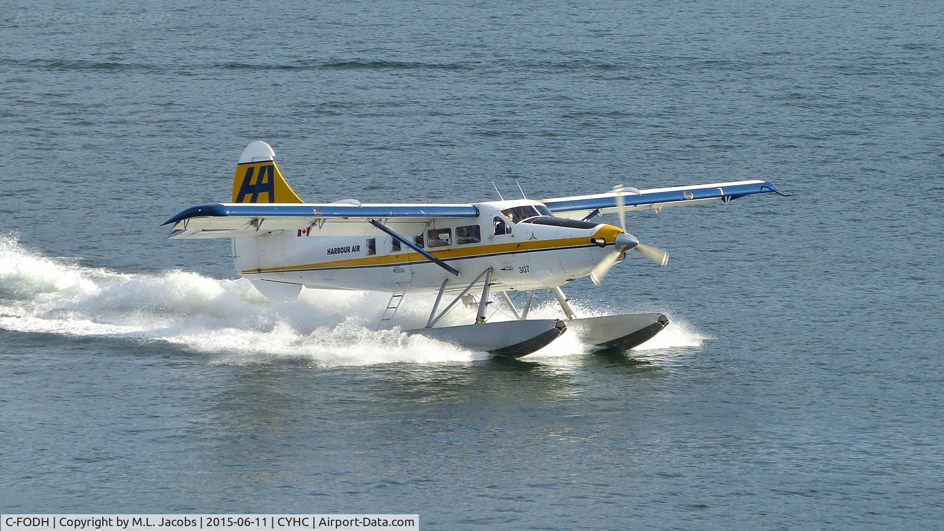 C-FODH, 1952 De Havilland Canada DHC-3T Vazar Turbine Otter Otter C/N 3, Harbour Air #307 just landed in Coal Harbour.