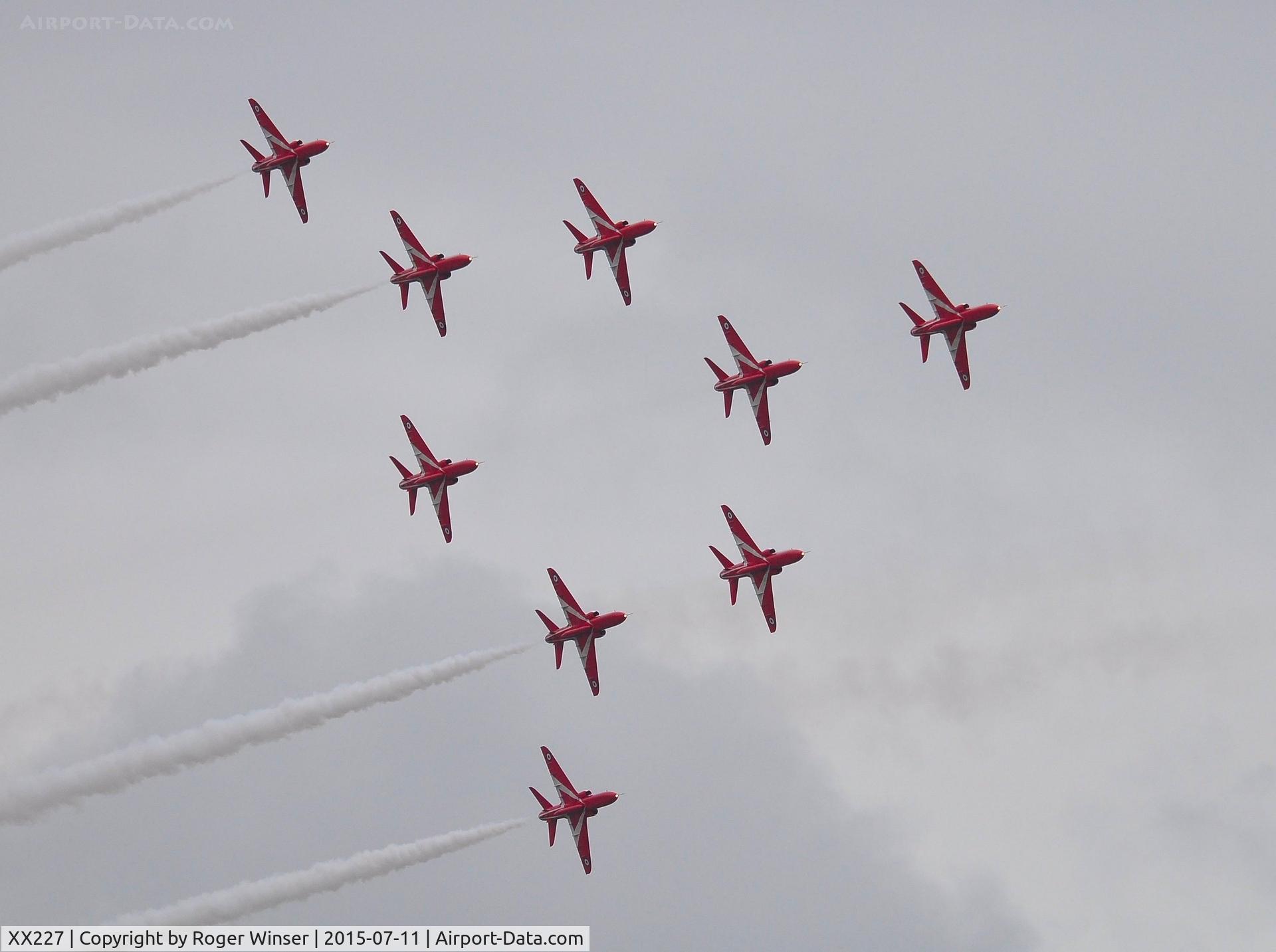 XX227, 1978 Hawker Siddeley Hawk T.1A C/N 063/312063, Off airport. XX227 leading the RAF Red Arrows on the first day of the Wales National Airshow held over Swansea Bay.