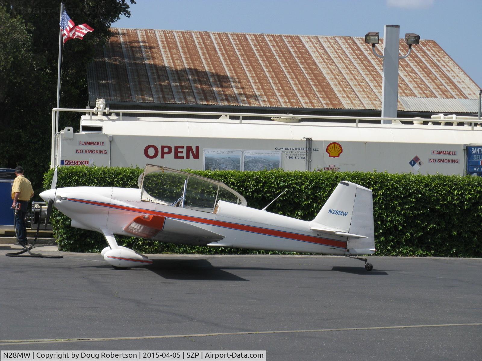 N28MW, 1986 Vans RV-4 C/N 1067, 1986 Waldorf VAN's RV-4, Lycoming O-320, the builder data plate has M Waldrop as builder (which see in another photo), the FAA registration is M Waldorf. Refueling.