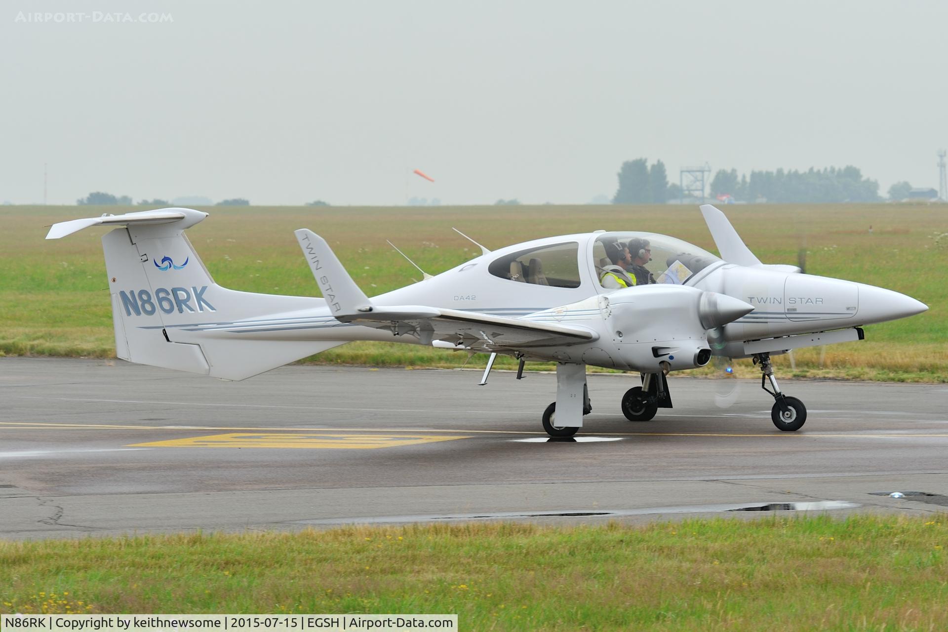 N86RK, 2005 Diamond DA-42NG Twin Star C/N 42.048, Leaving Norwich.