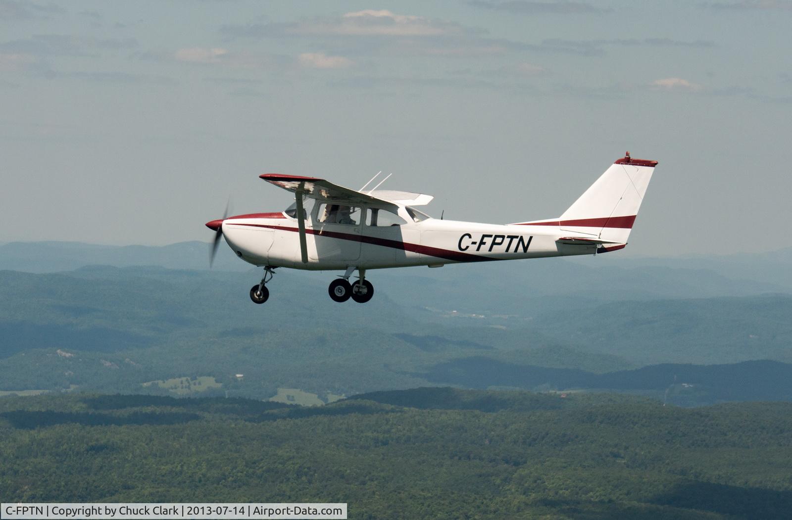 C-FPTN, 1964 Cessna 172E C/N 17251235, Air to air of PTN over QC