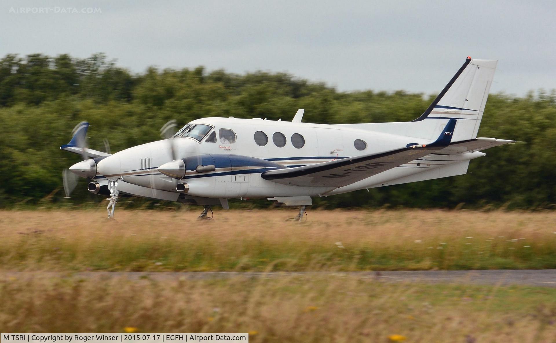 M-TSRI, Hawker Beechcraft C90GTI King Air C/N LJ-2033, Visiting King Air GTI operated by Timpson Ltd. departing Runway 22.
